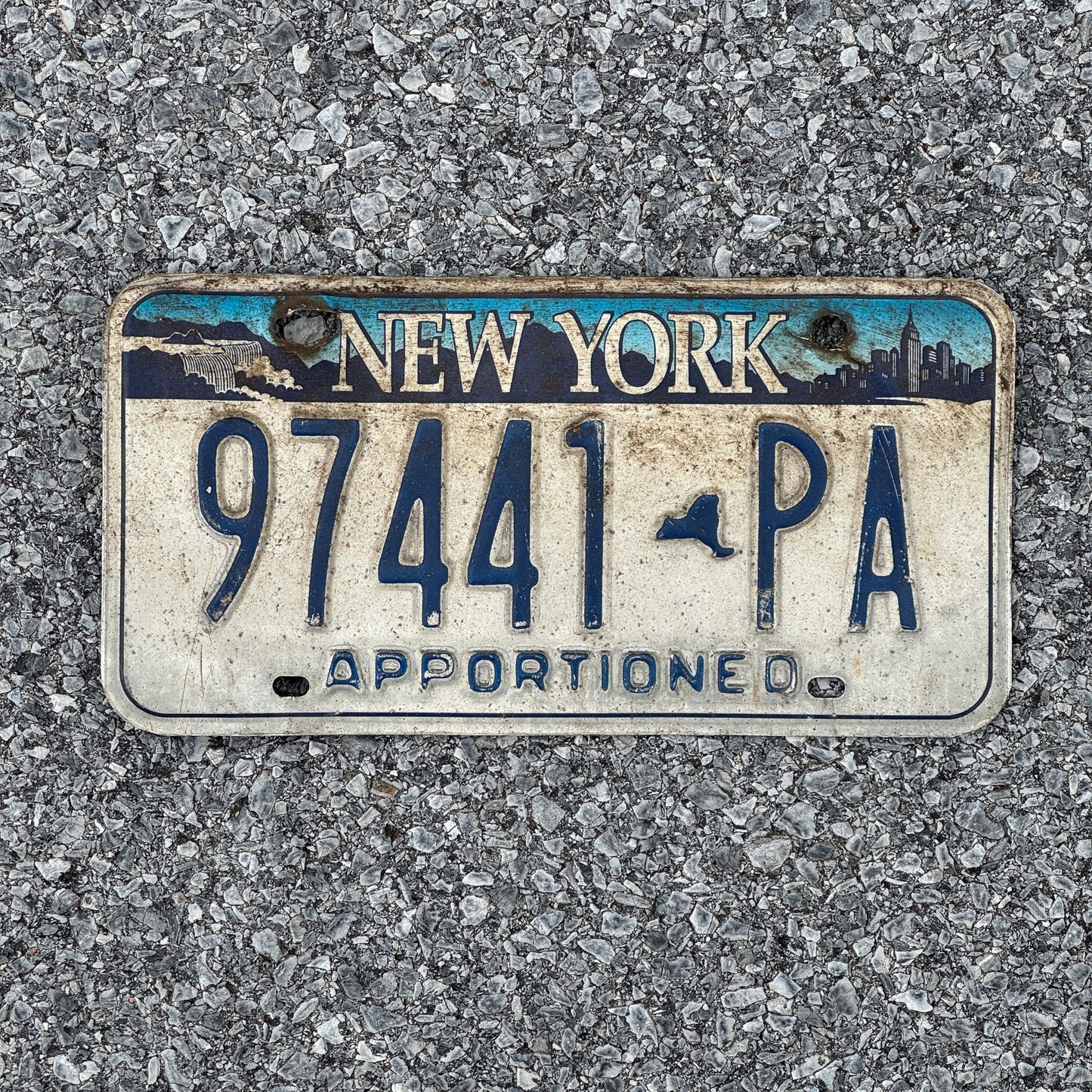 Photo of a 2001 New York Apportioned License Plate Auto Tag Garage Decor Vintage 97441 PA