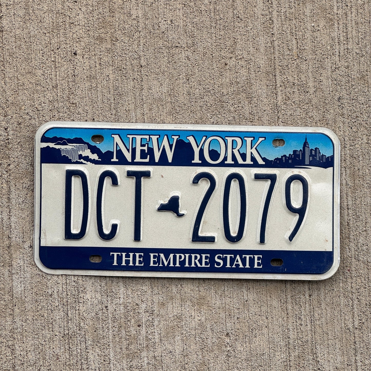 Photo of a 2001 New York License Plate Auto Tag Garage Decor Vintage DCT 2079
