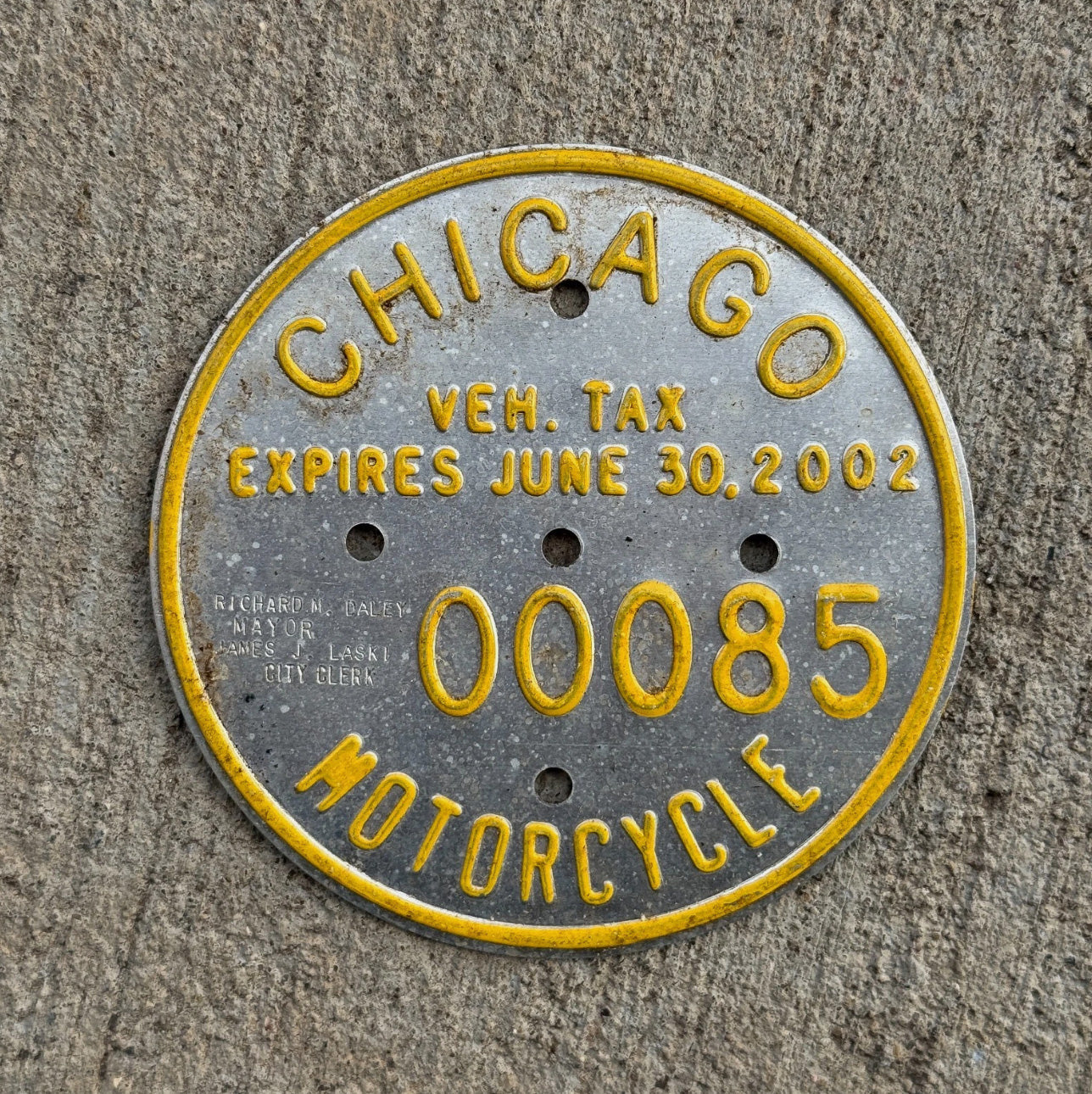 Photo of a 2002 Chicago MOTORCYCLE Tax Tag Disc Disk Medallion Auto Tag Garage Decor Vintage 00085