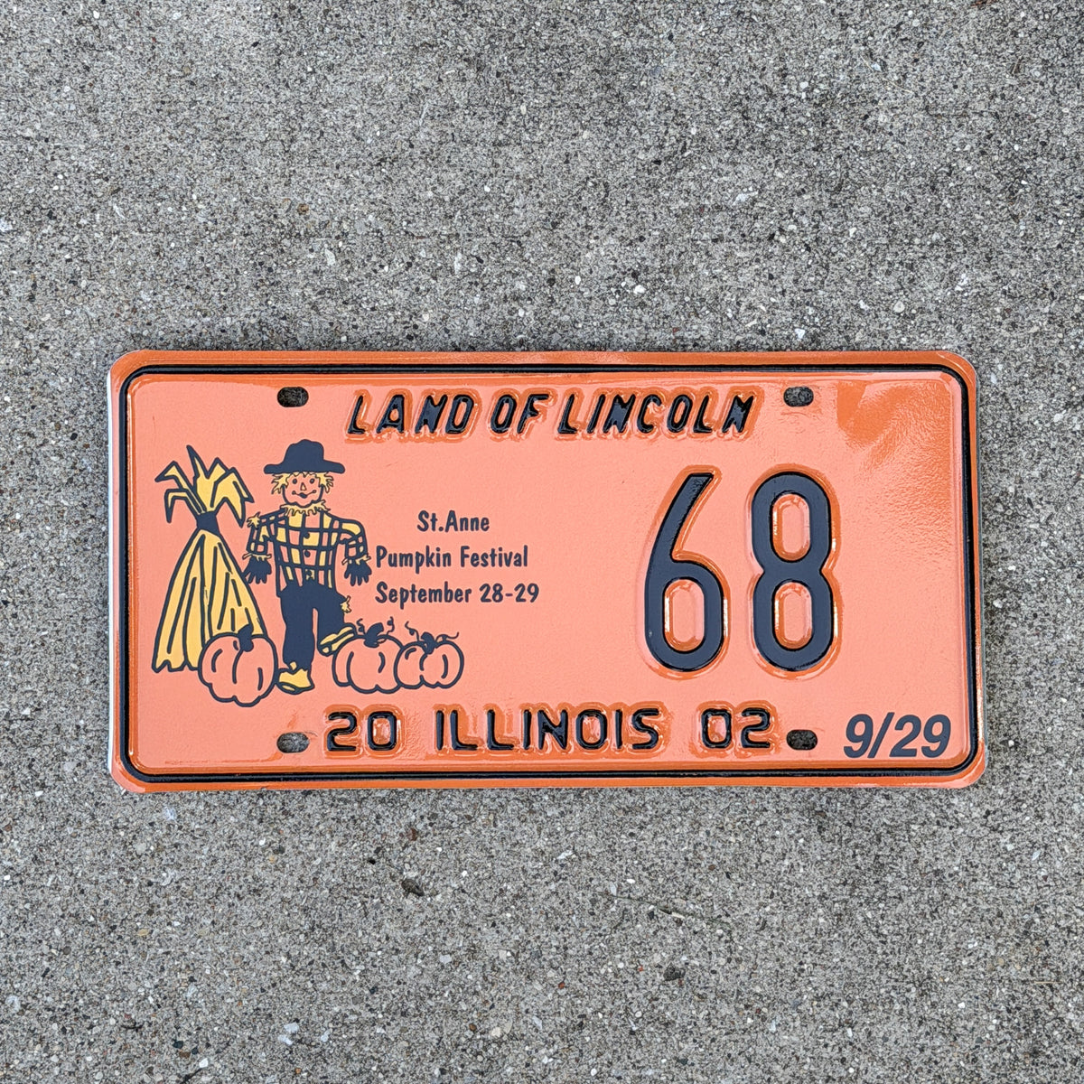 Photo of a 2002 Illinois Event License Plate Auto Tag Garage Decor Vintage St. Anne Pumpkin Festival Halloween 68 with original patina