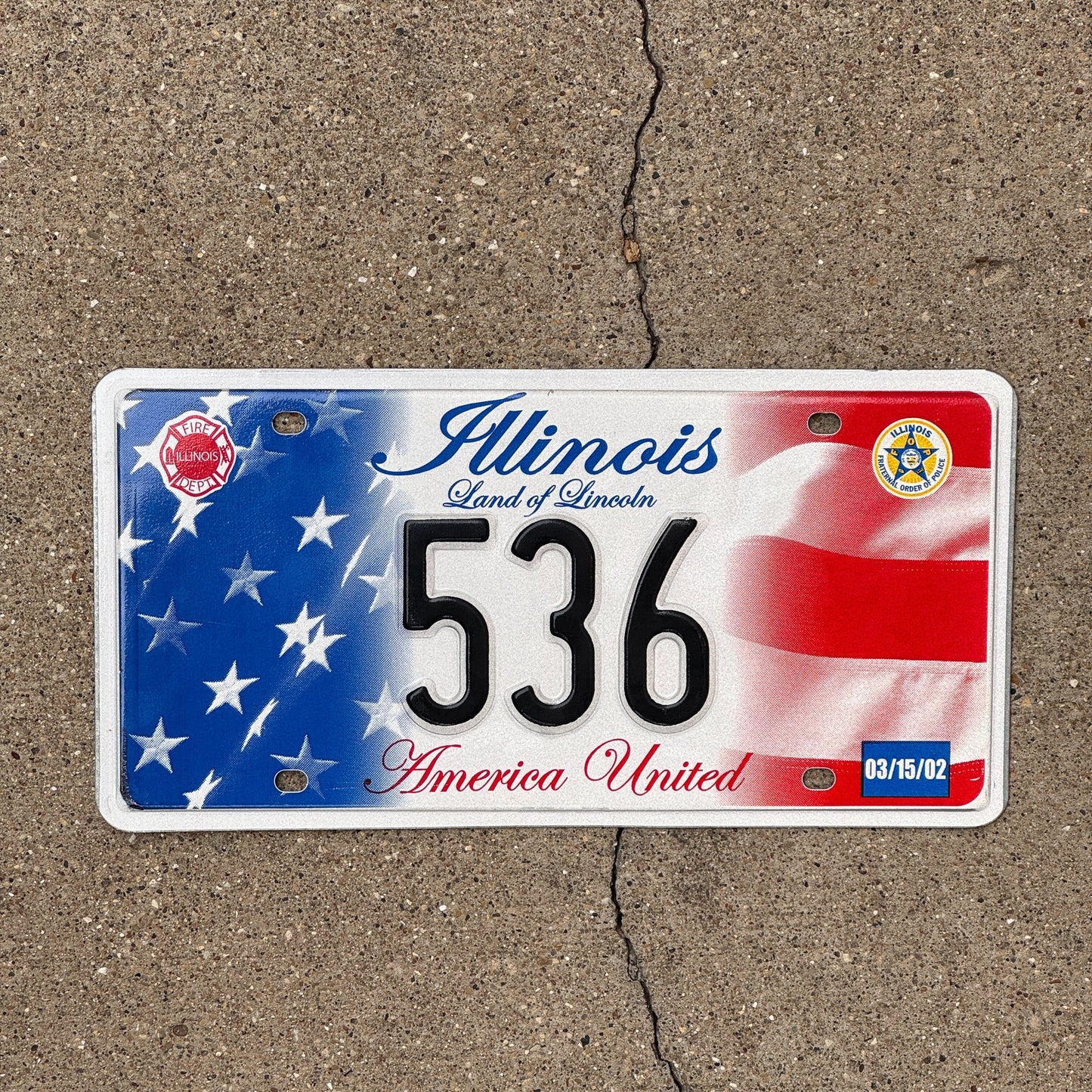 Photo of a 2002 Illinois Graphic / Specialty License Plate Auto Tag Garage Decor Vintage America United 9/11 Memorial 536