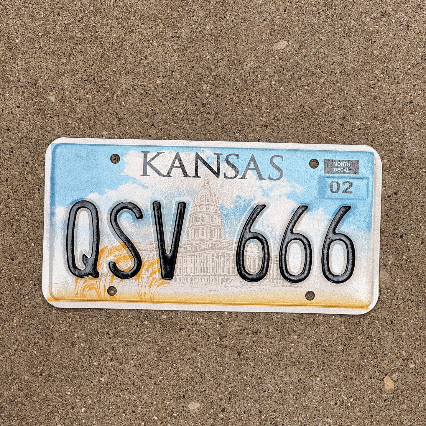 Photo of a 2002 Kansas License Plate Auto Tag Garage Decor Vintage Devil Evil Repeat QSV 666