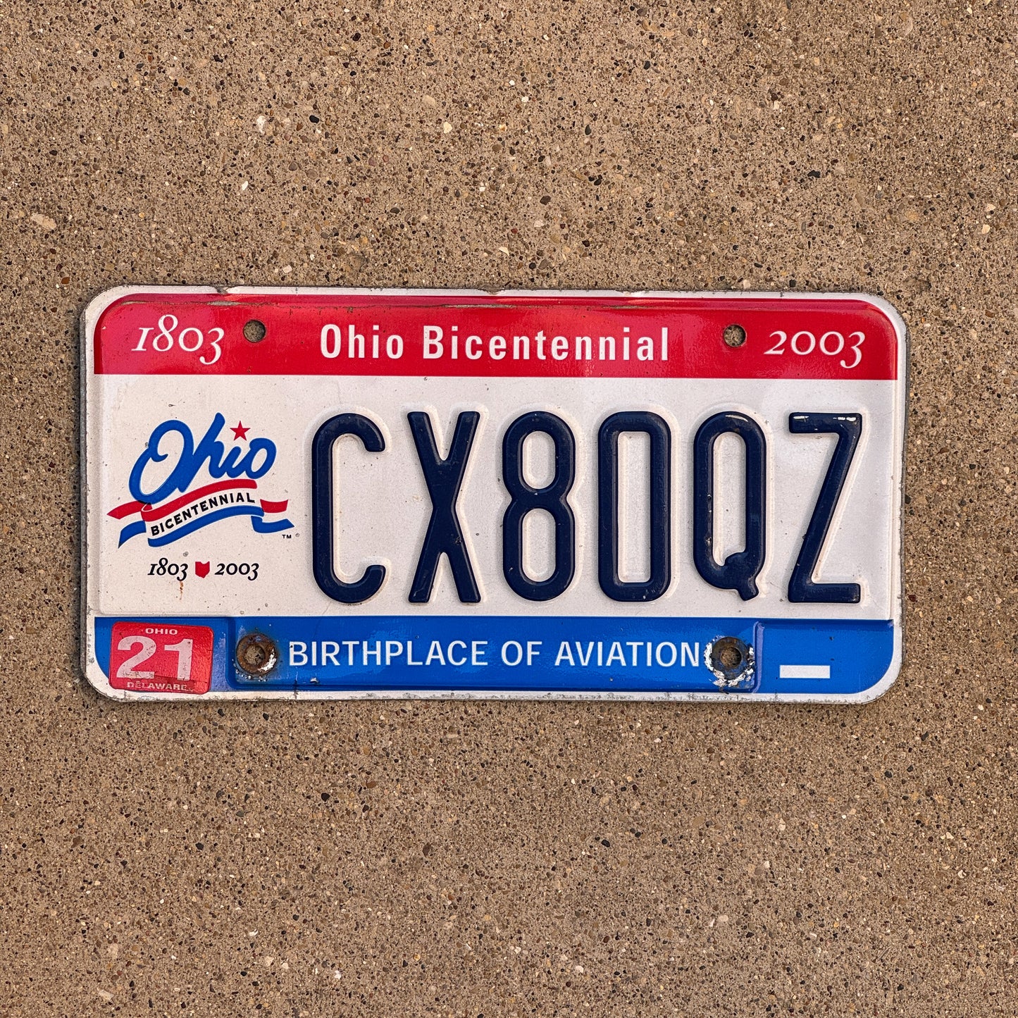 Photo of a 2002 Ohio License Plate Auto Tag Garage Decor Vintage CX 80 QZ with original patina