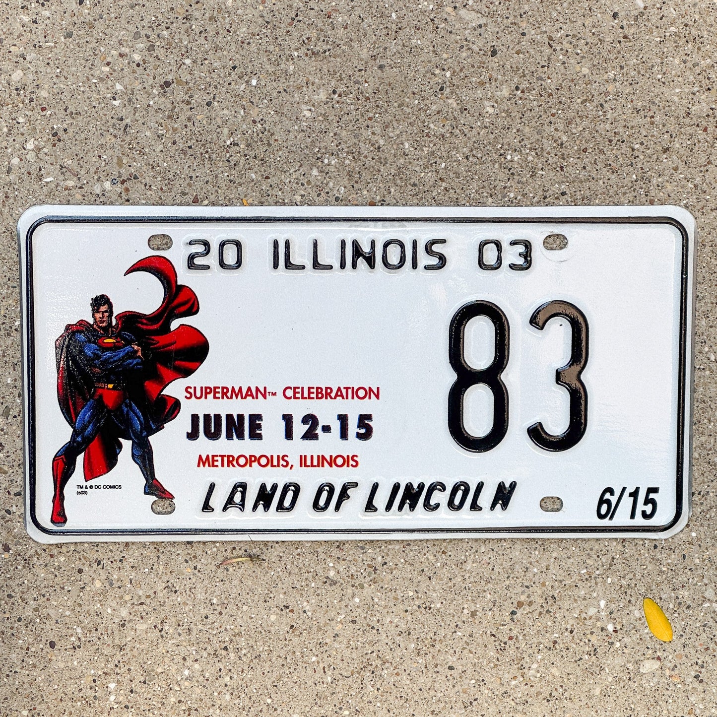 Photo of a 2003 Illinois Event License Plate Auto Tag 2 Garage Decor Metropolis Illinois Superman Comics 83 with original patina