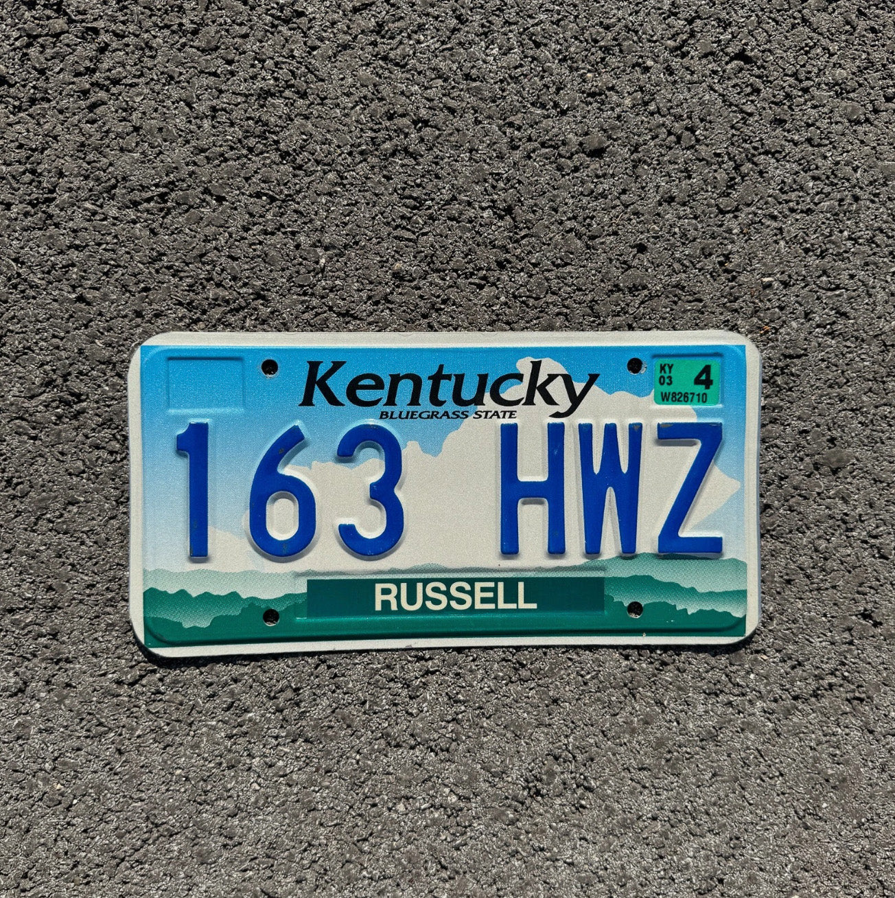 Photo of a 2003 Kentucky License Plate Auto Tag Garage Decor Vintage Russell County 163 HWZ