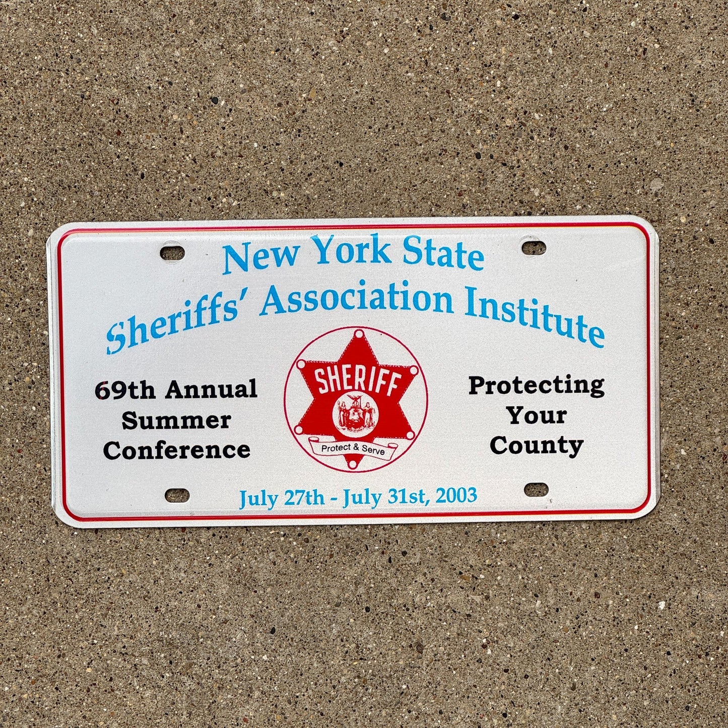 Photo of a 2003 New York State Sherriffs' Association Institute License Plate Auto Tag Garage Decor Vintage Event Plate