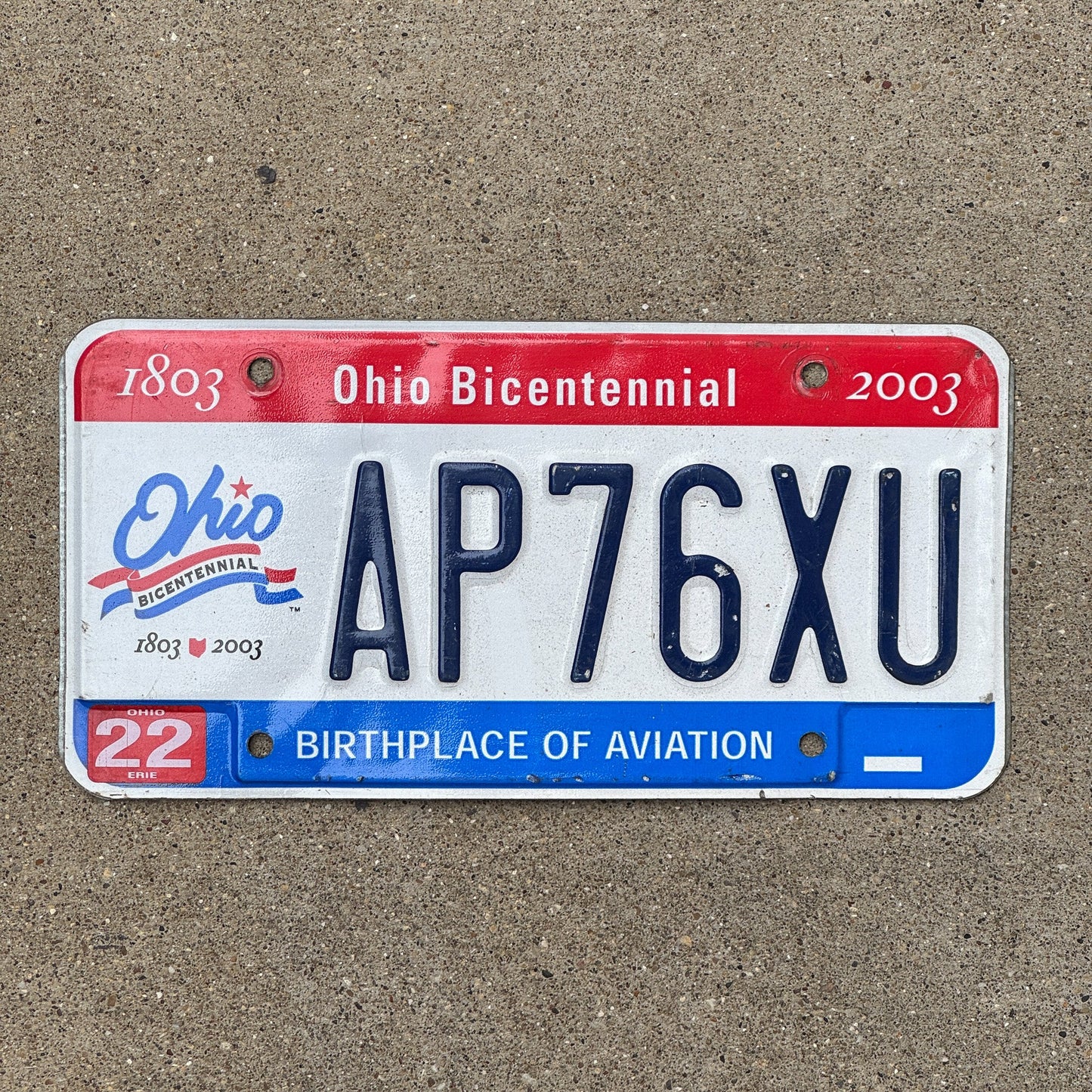 Photo of a 2003 Ohio License Plate Auto Tag Garage Decor Vintage AP 76 XU