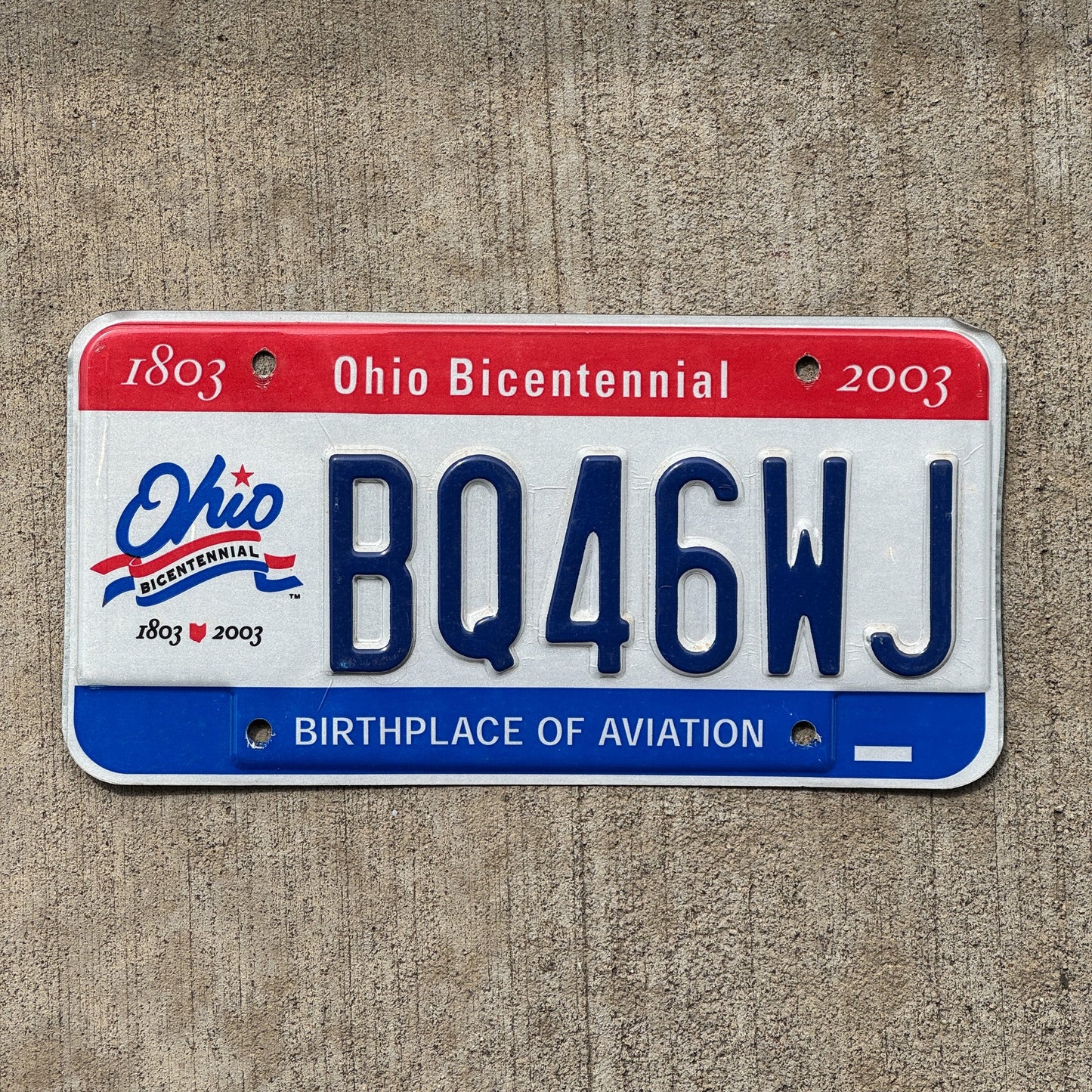 Photo of a 2003 Ohio License Plate Auto Tag Garage Decor Vintage BQ 46 WJ