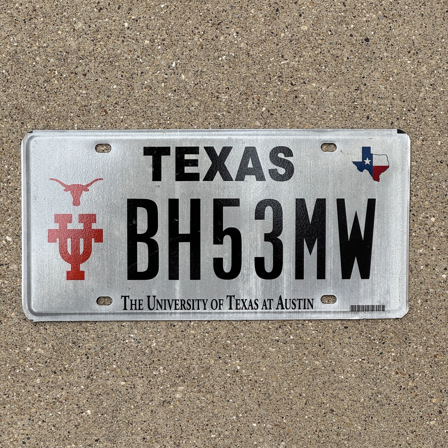 Photo of a 2003 Texas Graphic / Specialty License Plate Auto Tag Garage Decor Vintage University of Texas UT Austin BH 53 MW