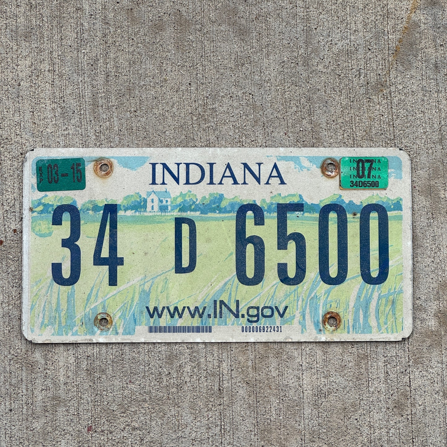 Photo of a 2004 2007 Indiana License Plate Auto Tag Garage Decor Vintage 34 D 6500 with original patina