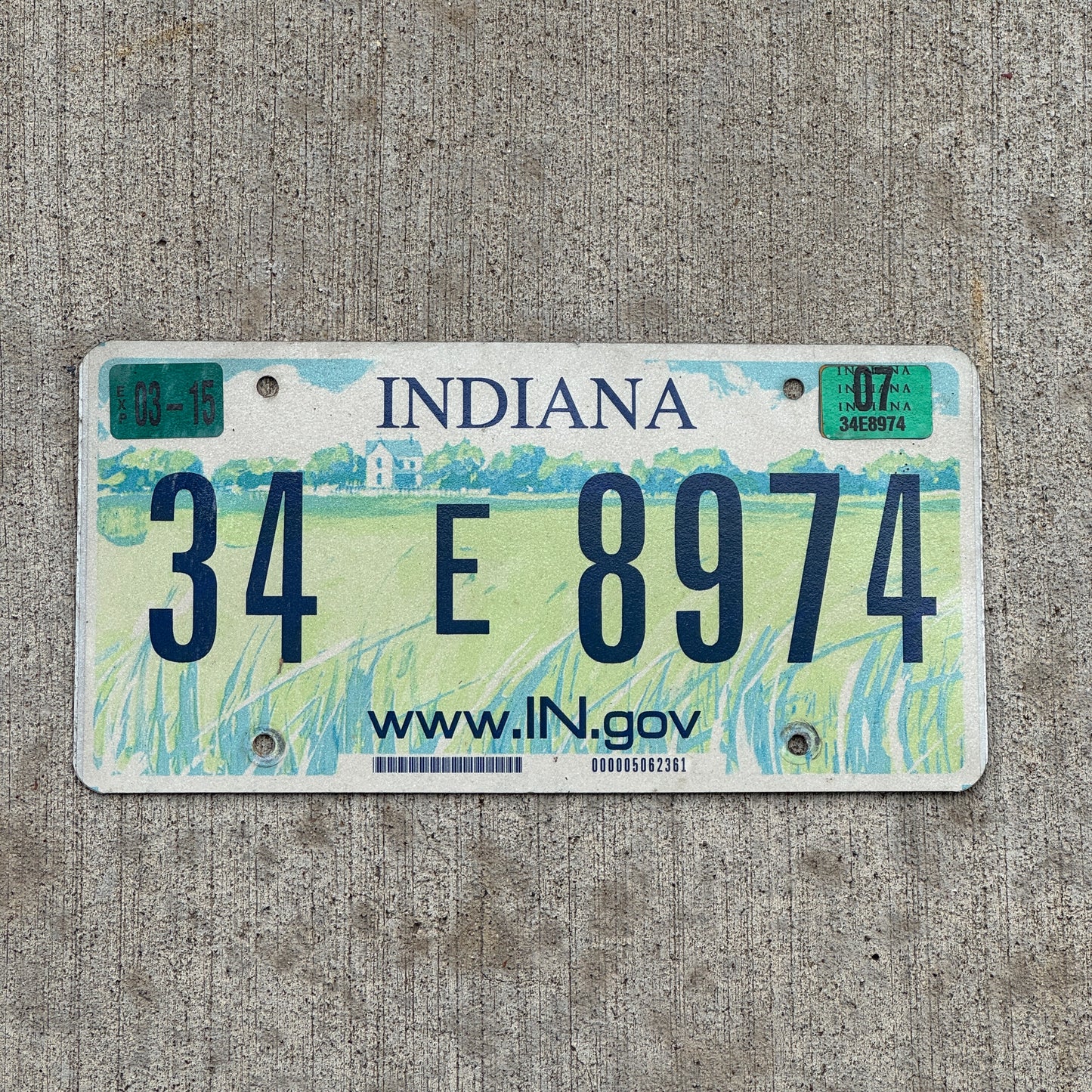 Photo of a 2004 2007 Indiana License Plate Auto Tag Garage Decor Vintage 34 E 8974 with original patina