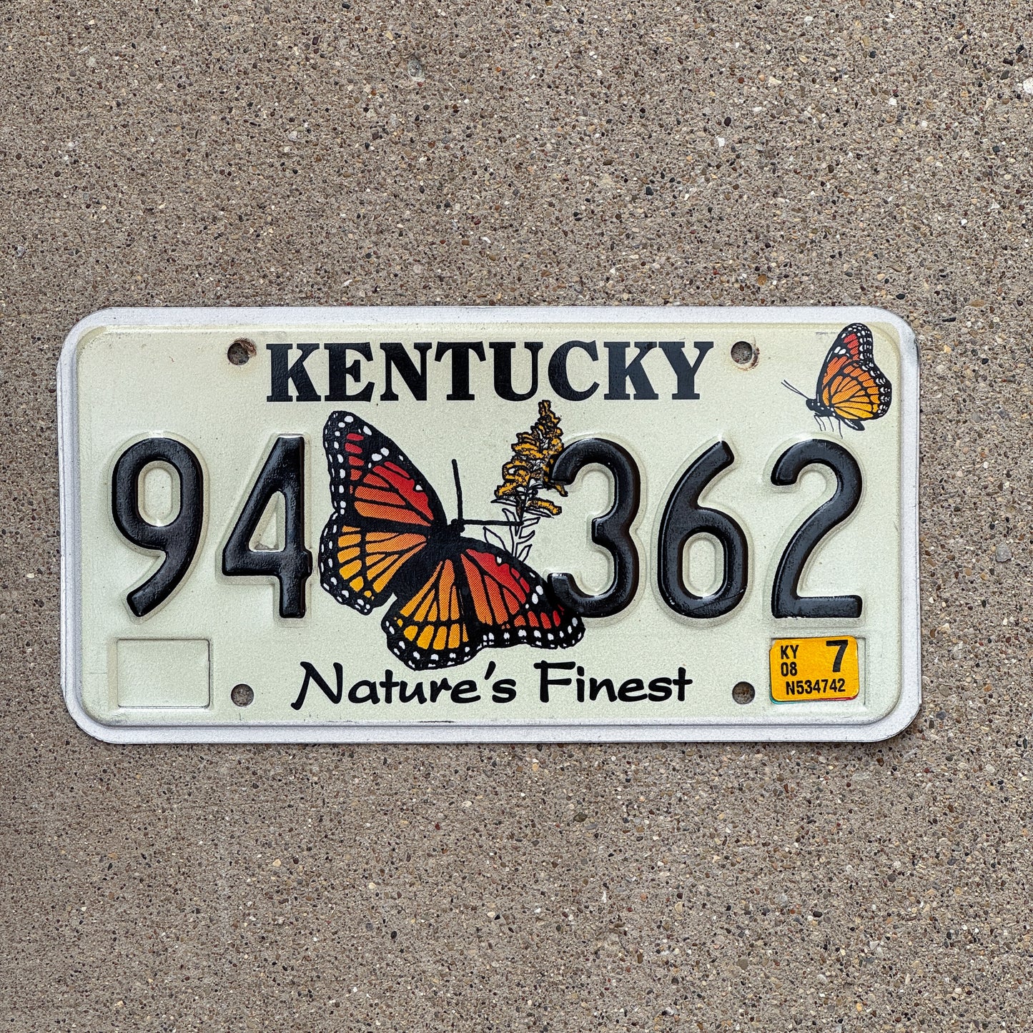 Photo of a 2004 2008 Kentucky Graphic / Specialty License Plate Auto Tag Garage Decor Vintage Butterfly Nature Wildlife 94 362 with original patina