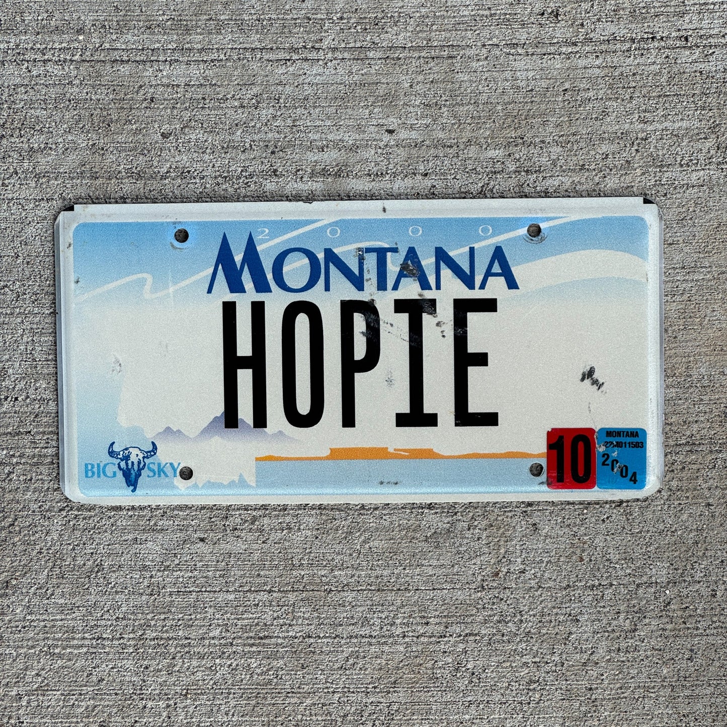 Photo of a 2004 Montana Vanity License Plate Auto Tag Garage Decor Vintage Hopi Native American Indian Tribe HOPIE