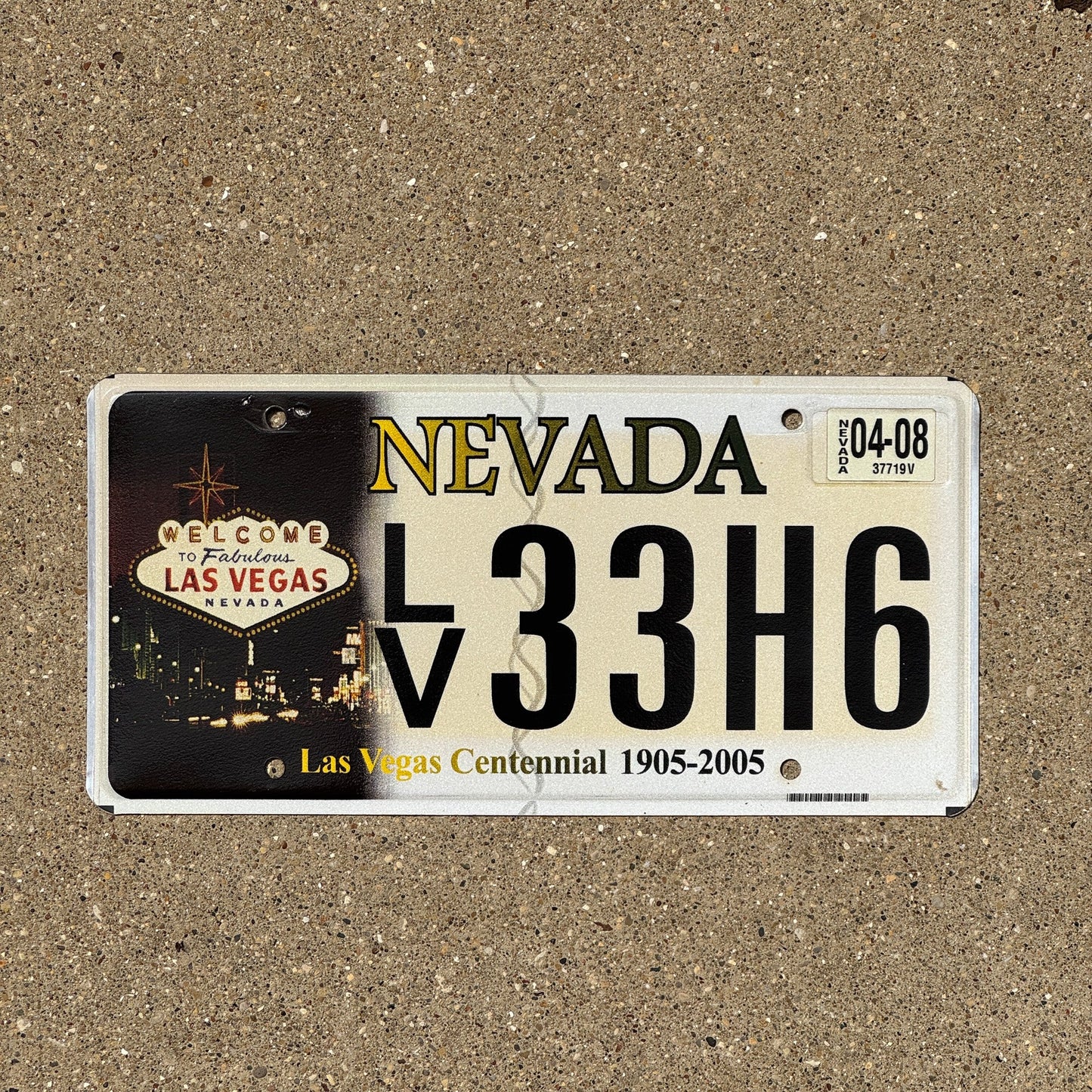 Photo of a 2005 2008 Nevada Graphic / Specialty License Plate Auto Tag Garage Decor Vintage Las Vegas Centennial LV 33H6