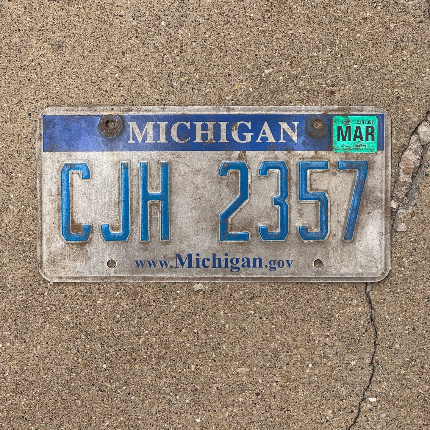 Photo of a 2006 2012 Michigan License Plate Auto Tag Garage Decor Vintage CJH 2357