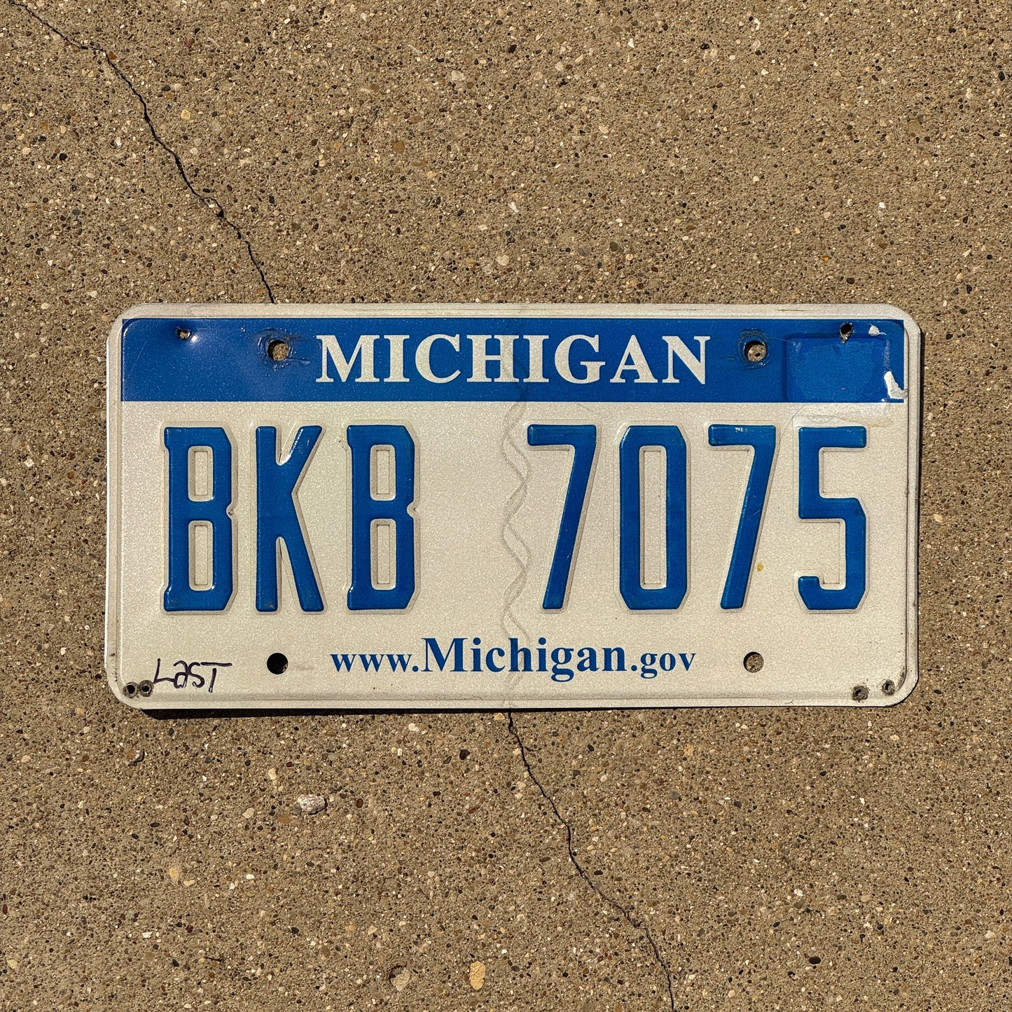 Photo of a 2006 Michigan License Plate Auto Tag Garage Decor Vintage BKB 7075
