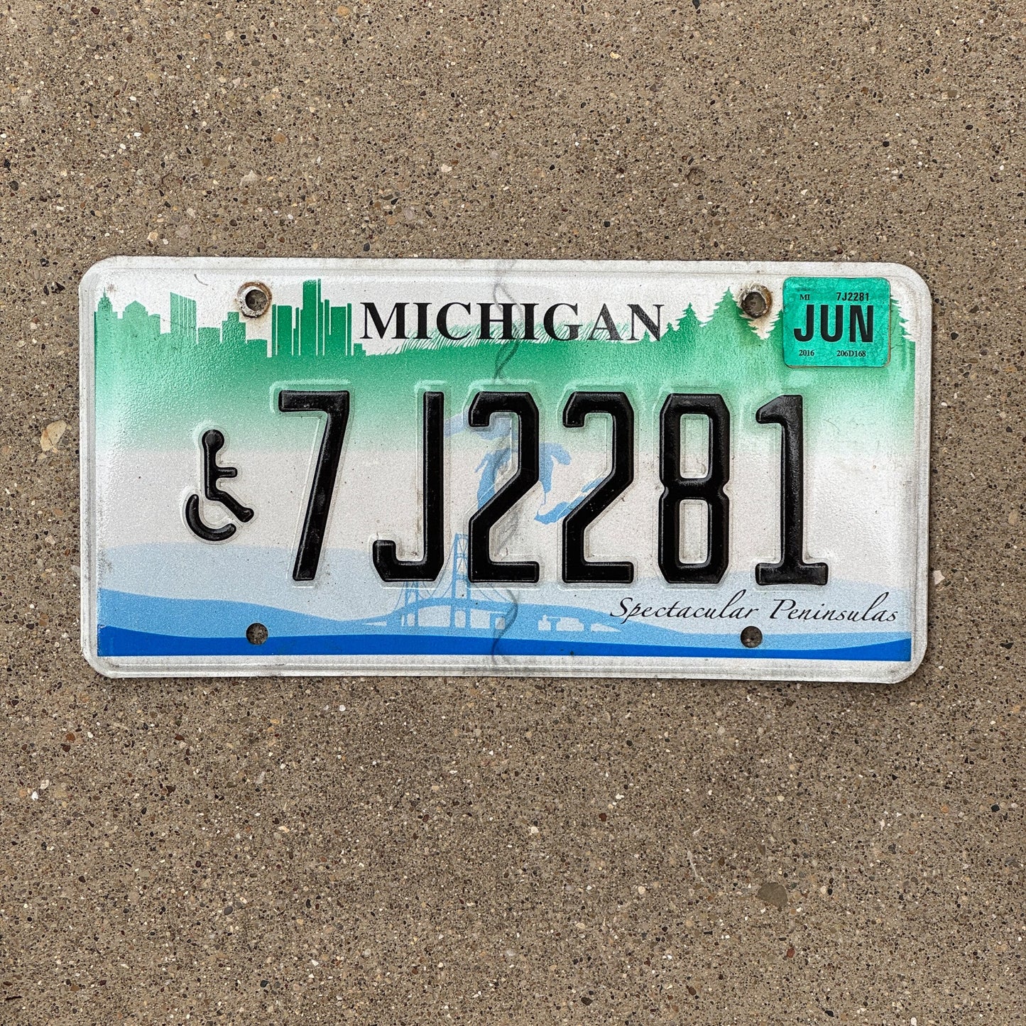 Photo of a 2007 2016 Michigan Handicapped License Plate Auto Tag Garage Decor Vintage Graphic / Specialty Spectacular Peninsulas 7J 2281