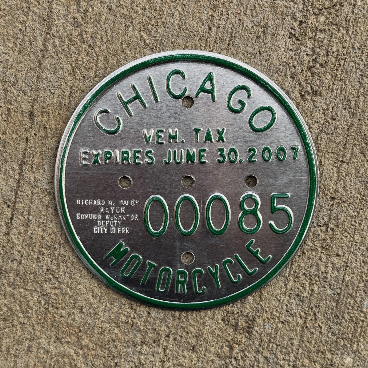 Photo of a 2007 Chicago MOTORCYCLE Tax Tag Disc Disk Medallion Auto Tag Garage Decor Vintage 00085