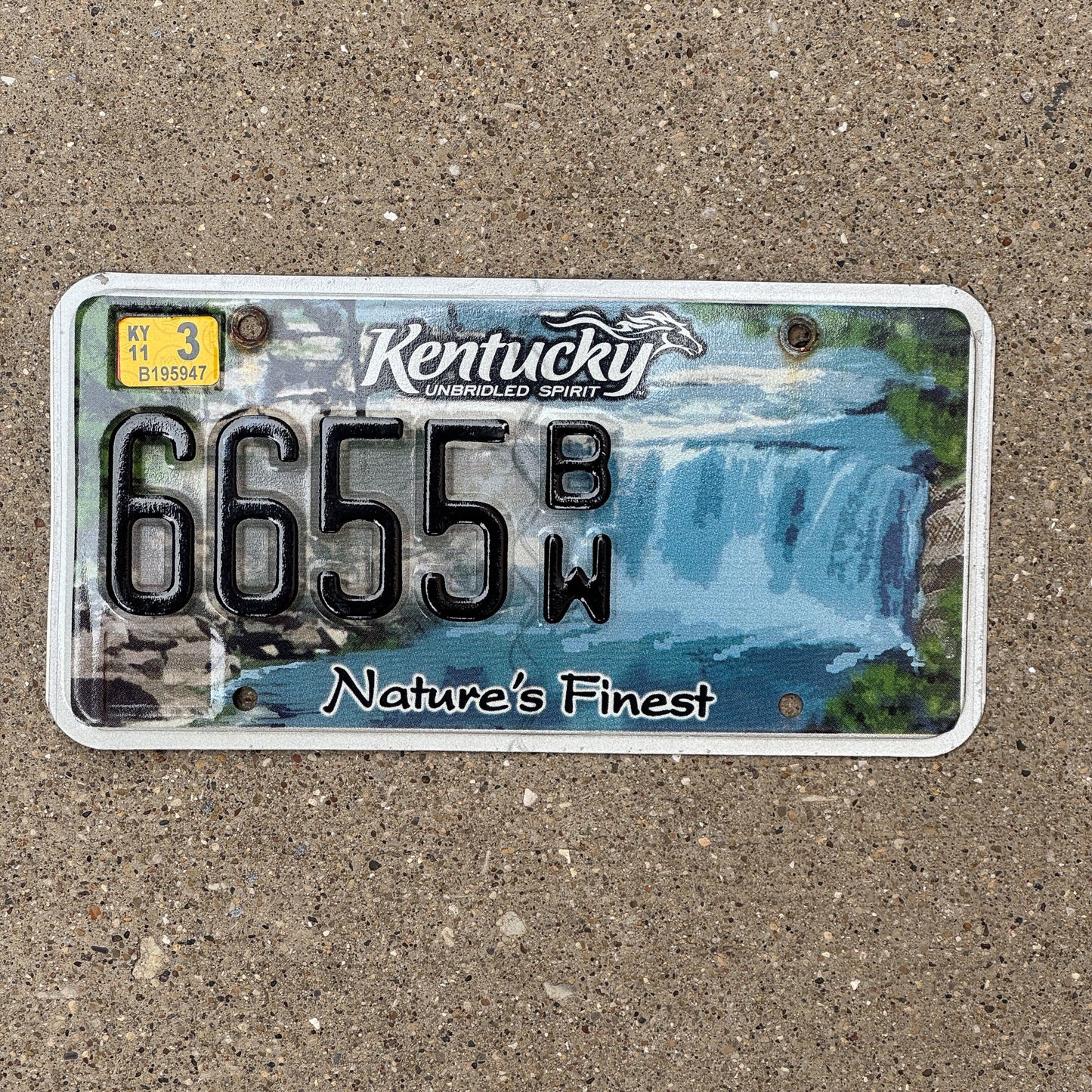 Photo of a 2009 2011 Kentucky Graphic / Specialty License Plate Auto Tag Garage Decor Vintage Nature's Finest Waterfall 6655 BW