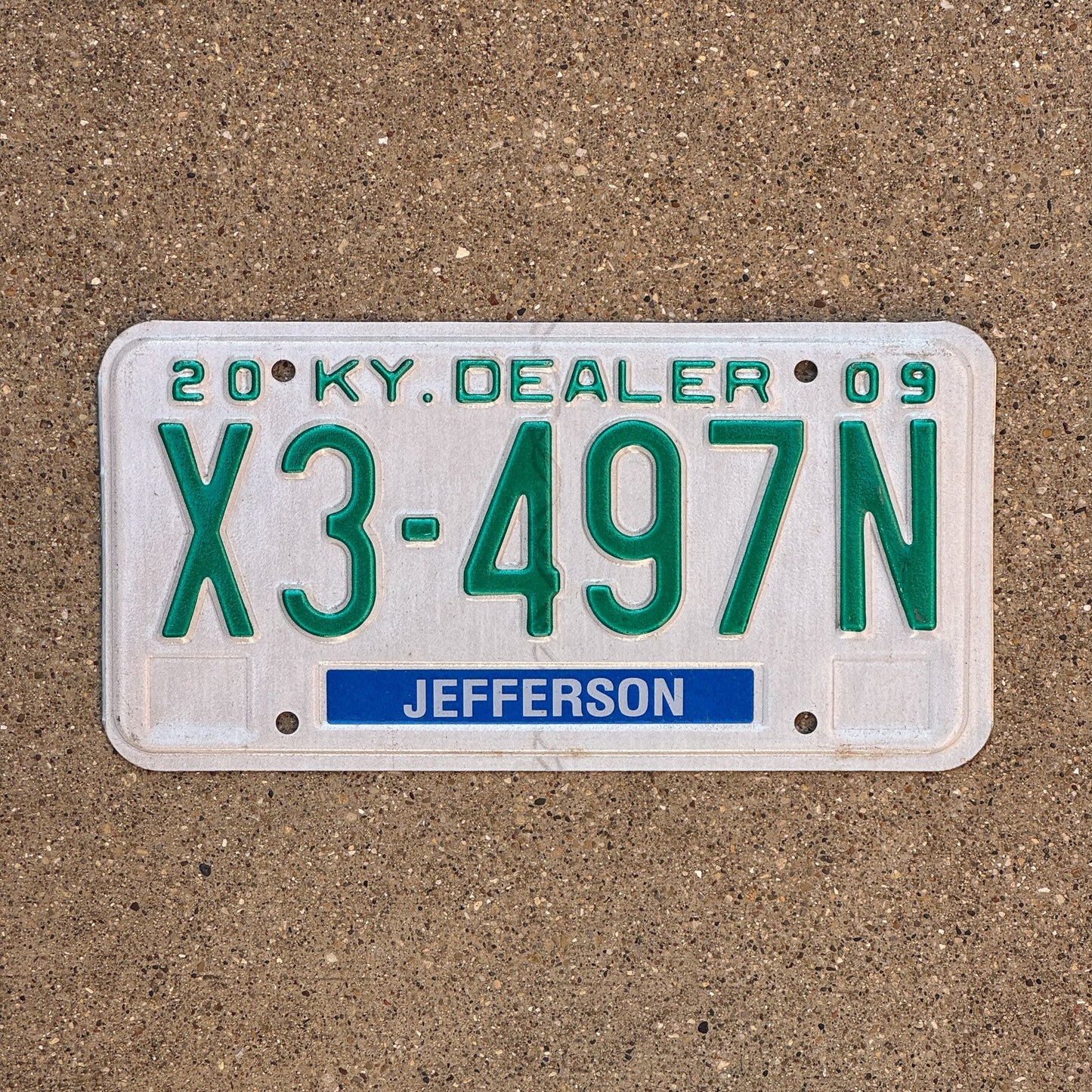 Photo of a 2009 Kentucky Dealer License Plate Auto Tag Garage Decor Vintage Jefferson County X3 497N