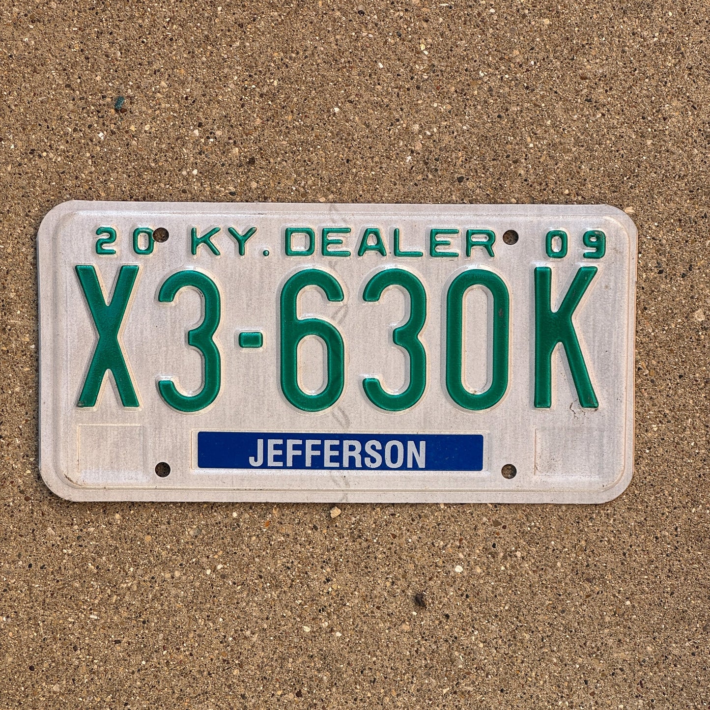 Photo of a 2009 Kentucky Dealer License Plate Auto Tag Garage Decor Vintage Jefferson County X3 630K