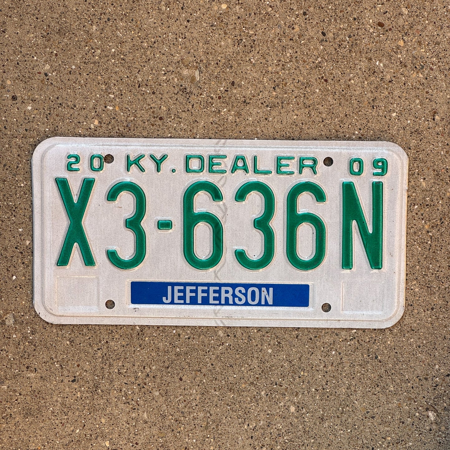 Photo of a 2009 Kentucky Dealer License Plate Auto Tag Garage Decor Vintage Jefferson County X3 636N