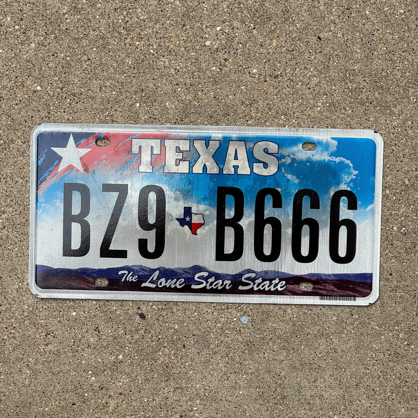 Photo of a 2009 Texas License Plate Auto Tag 2 Garage Decor Repeat Devil Evil BZ9 C 666