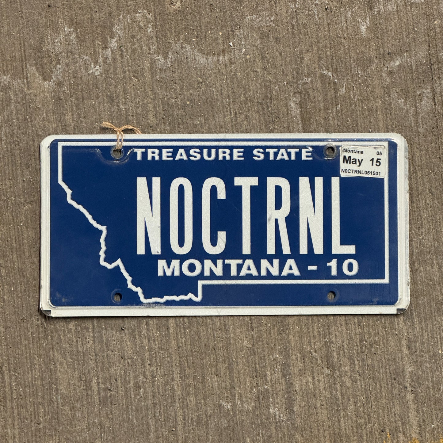Photo of a 2010 2015 Montana Vanity License Plate Auto Tag Garage Decor Vintage Nocturnal NOCTRNL with original patina