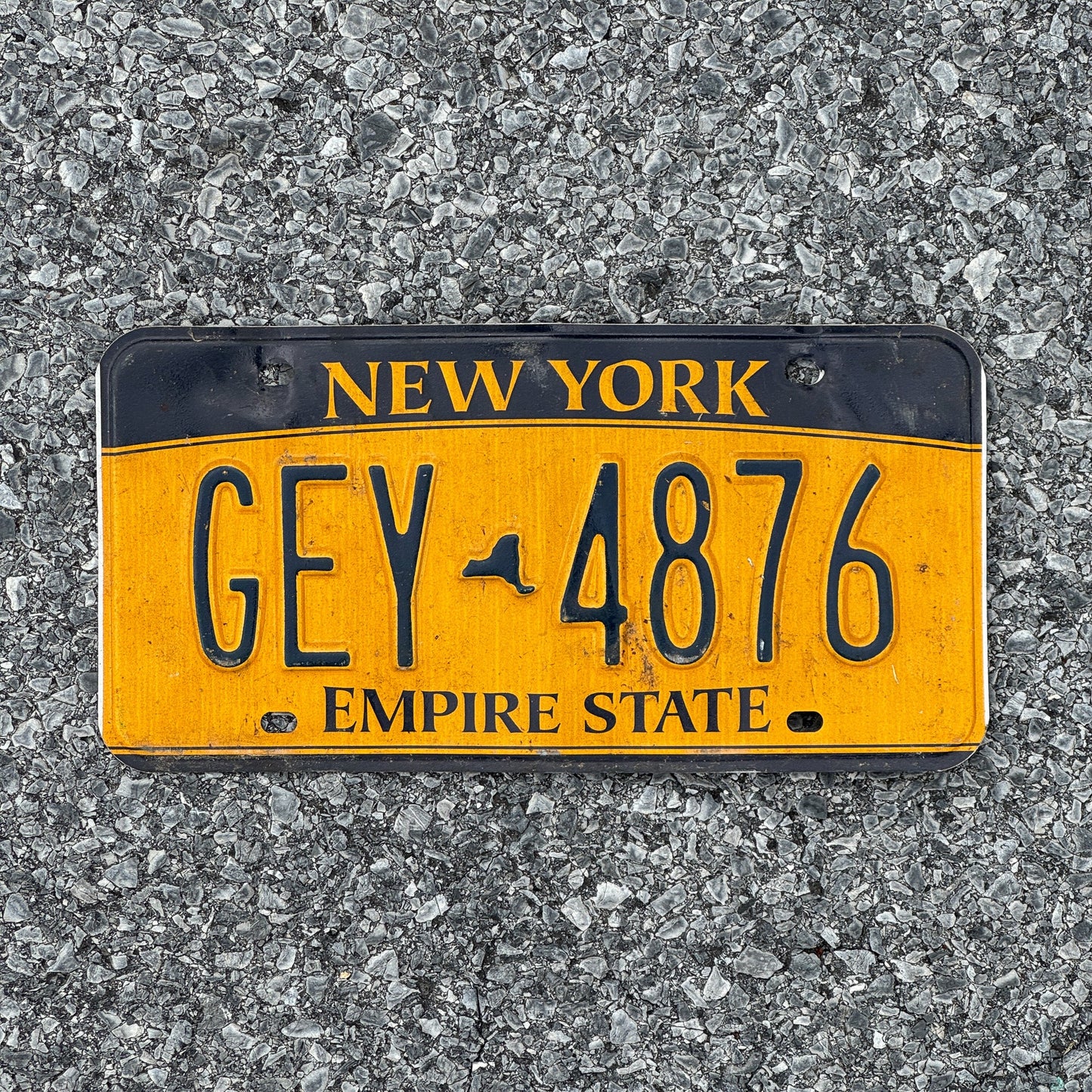 Photo of a 2010 New York License Plate Auto Tag Garage Decor Vintage GEY 4876