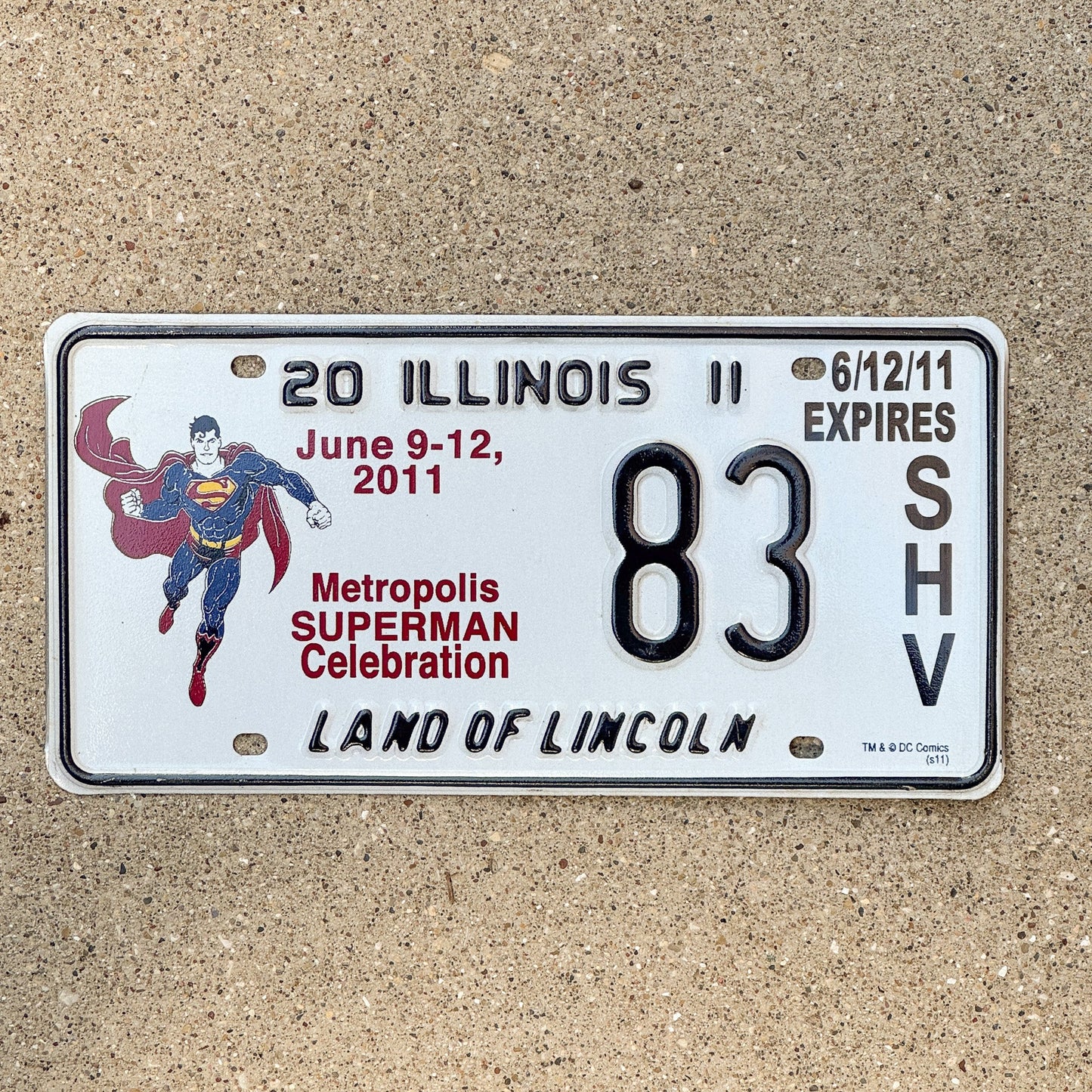 Photo of a 2011 Illinois Event License Plate Auto Tag 1 Garage Decor Metropolis Illinois Superman Comics 83 with original patina
