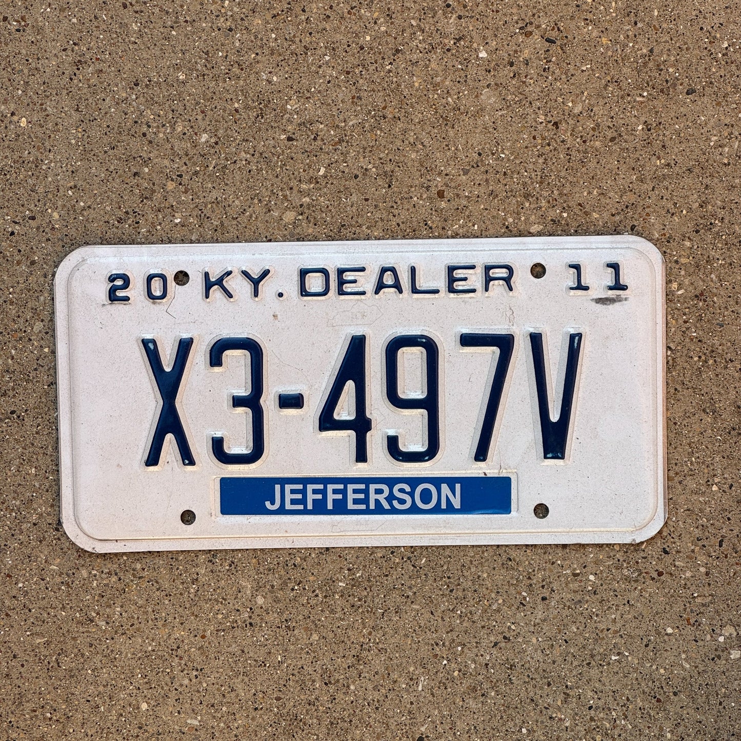 Photo of a 2011 Kentucky Dealer License Plate Auto Tag Garage Decor Vintage Jefferson County X3 497V