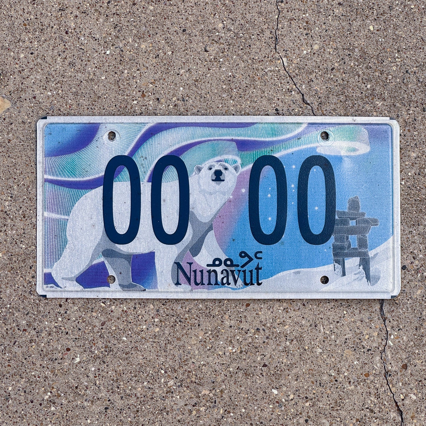 Photo of a 2011 Nunavut Sample License Plate Auto Tag Garage Decor Vintage 00 00