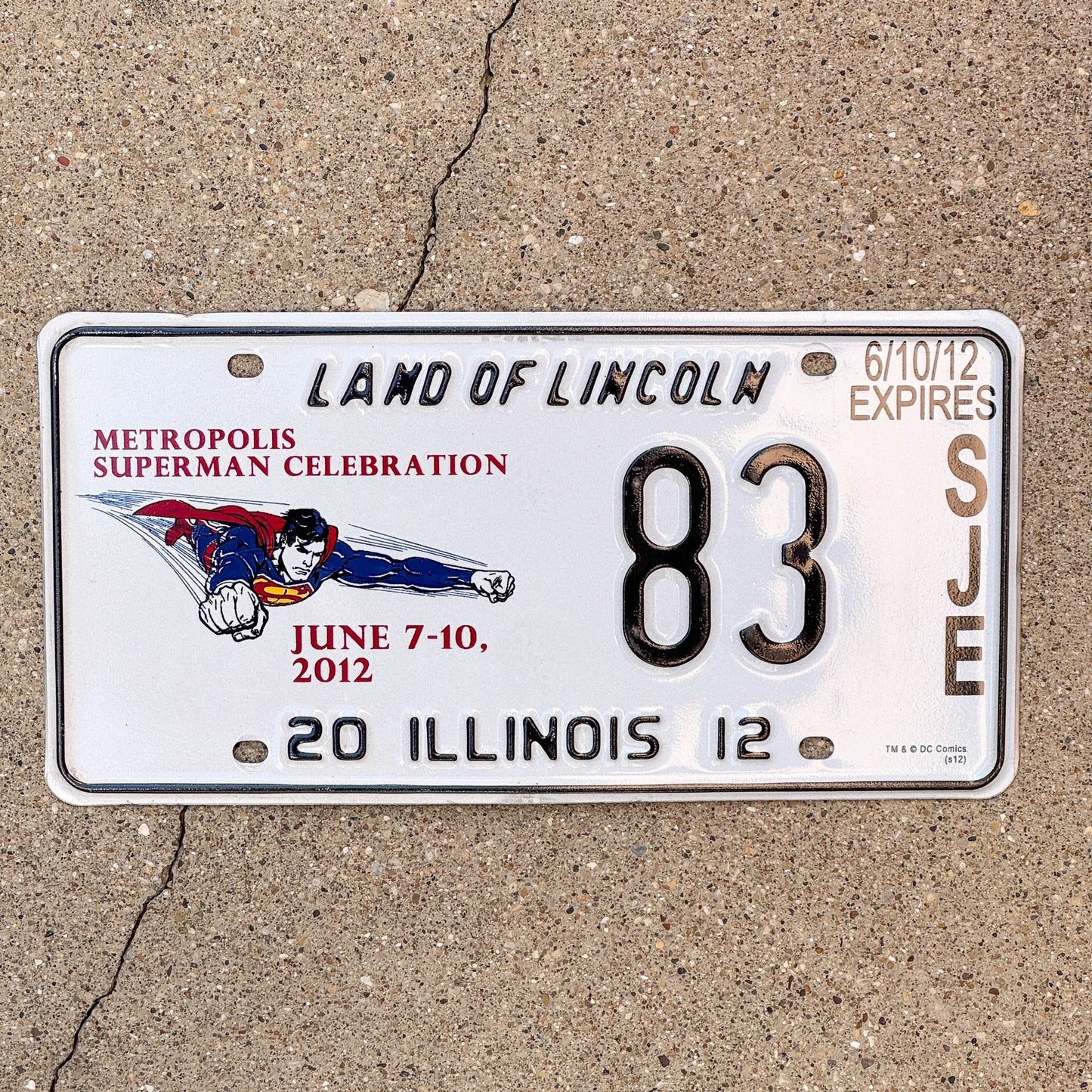 Photo of a 2012 Illinois Event License Plate Auto Tag 1 Garage Decor Metropolis Illinois Superman Comics 83 with original patina