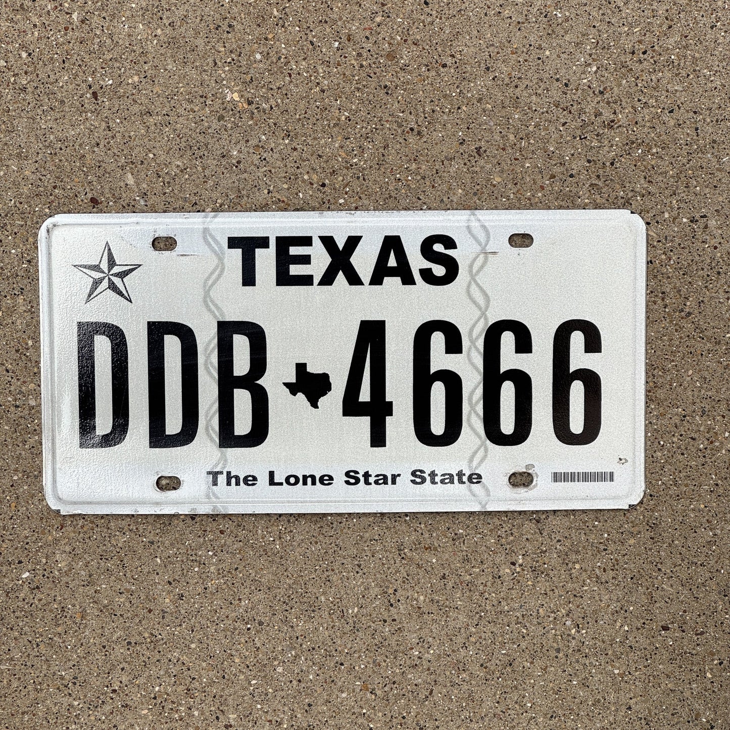 Photo of a 2012 Texas License Plate Auto Tag Garage Decor Vintage 666 Repeat Devil Evil DDB 4666