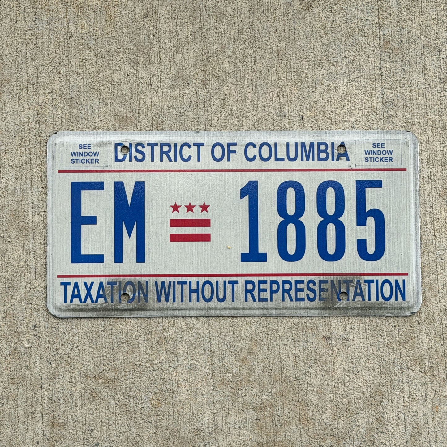 Photo of a 2013 Washington DC License Plate Auto Tag 2 Vintage Garage Taxation Without Representation EM 1885 with original patina