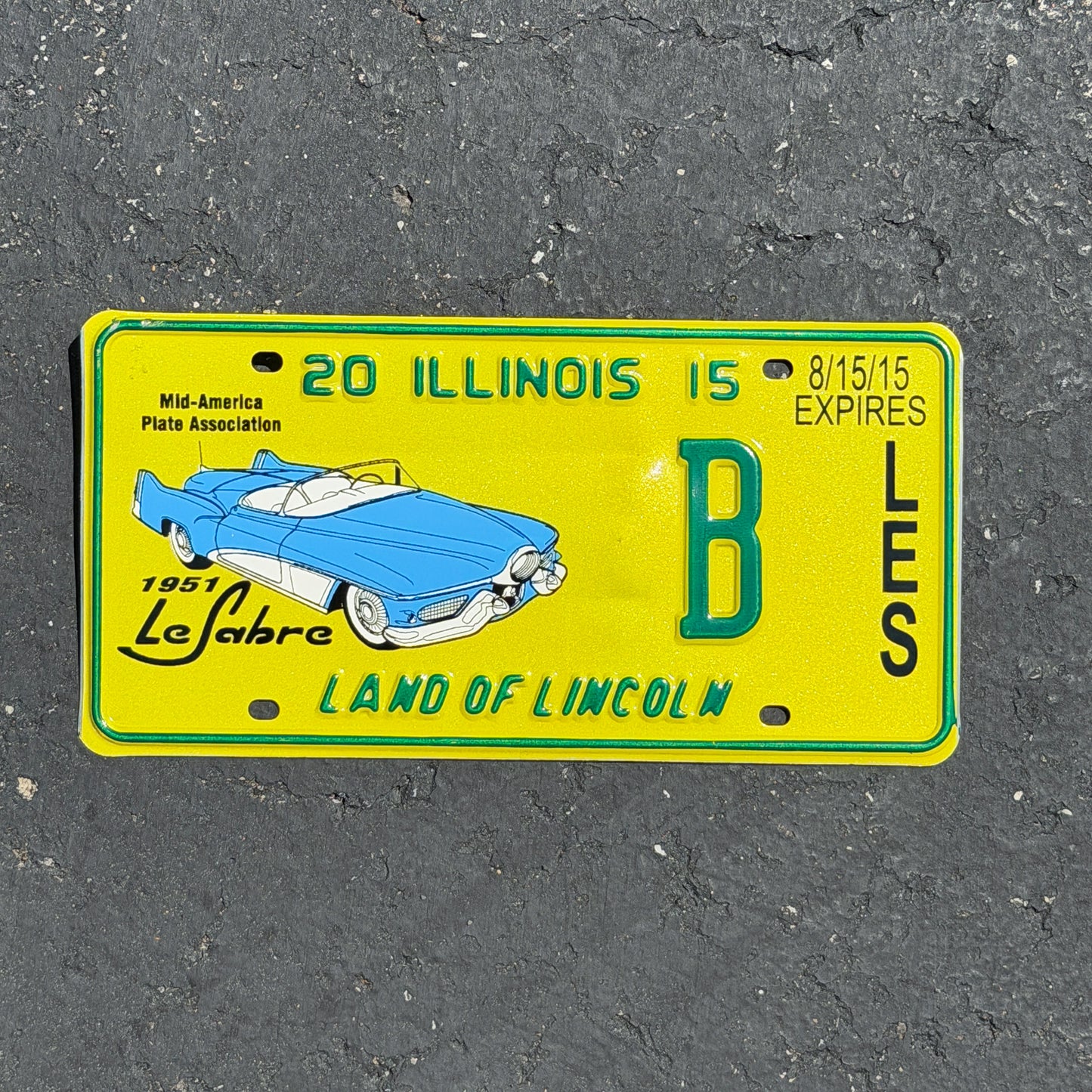 Photo of a 2015 2015 Illinois Event License Plate Auto Tag Garage Decor Vintage MAPA Buick LeSabre B with original patina