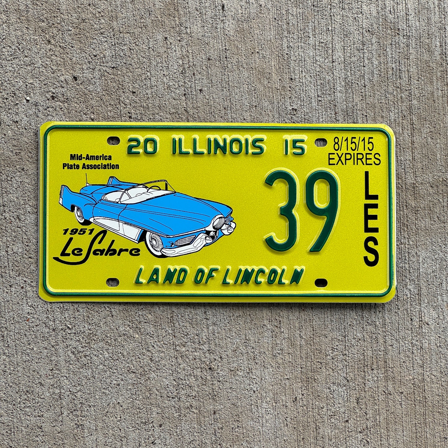 Photo of a 2015 Illinois Event License Plate Auto Tag Garage Decor Vintage 1951 Le Sabre Two Digit 39 with original patina