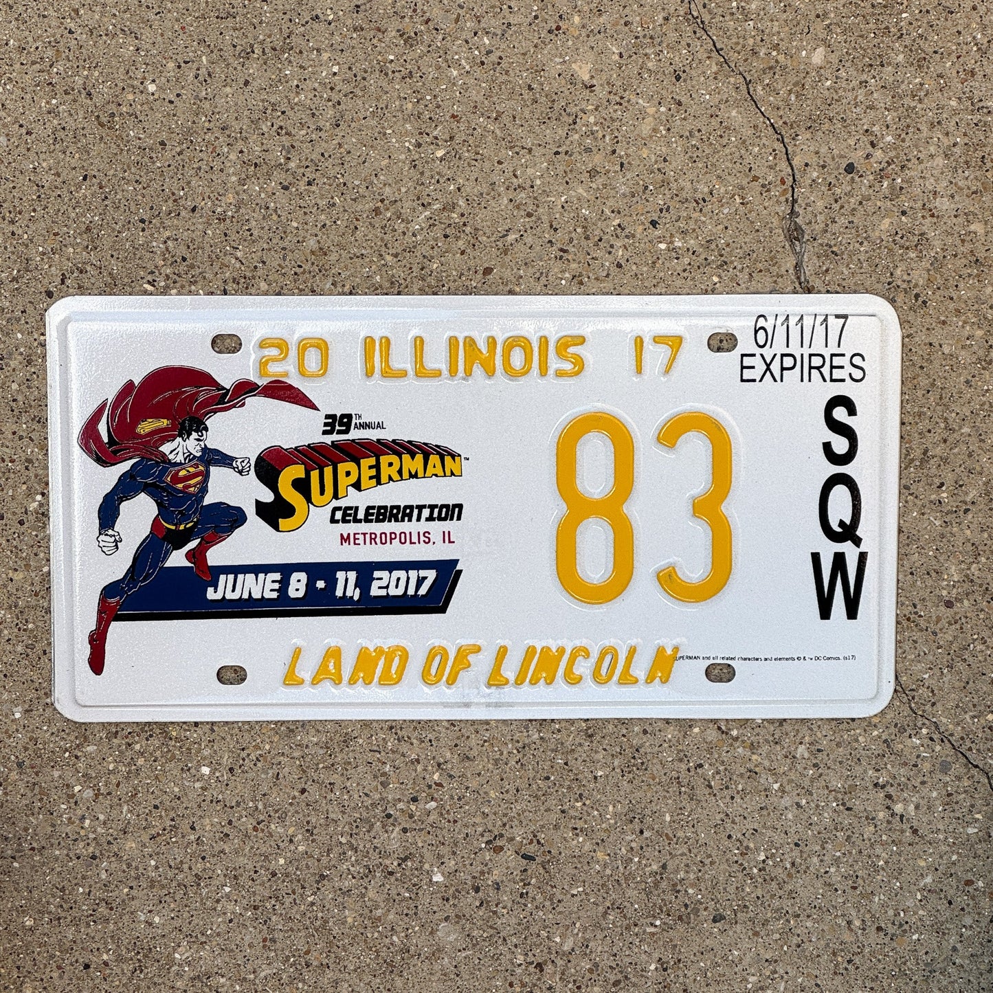 Photo of a 2017 Illinois Event License Plate Auto Tag 1 Garage Decor Metropolis Illinois Superman Comics 83 with original patina