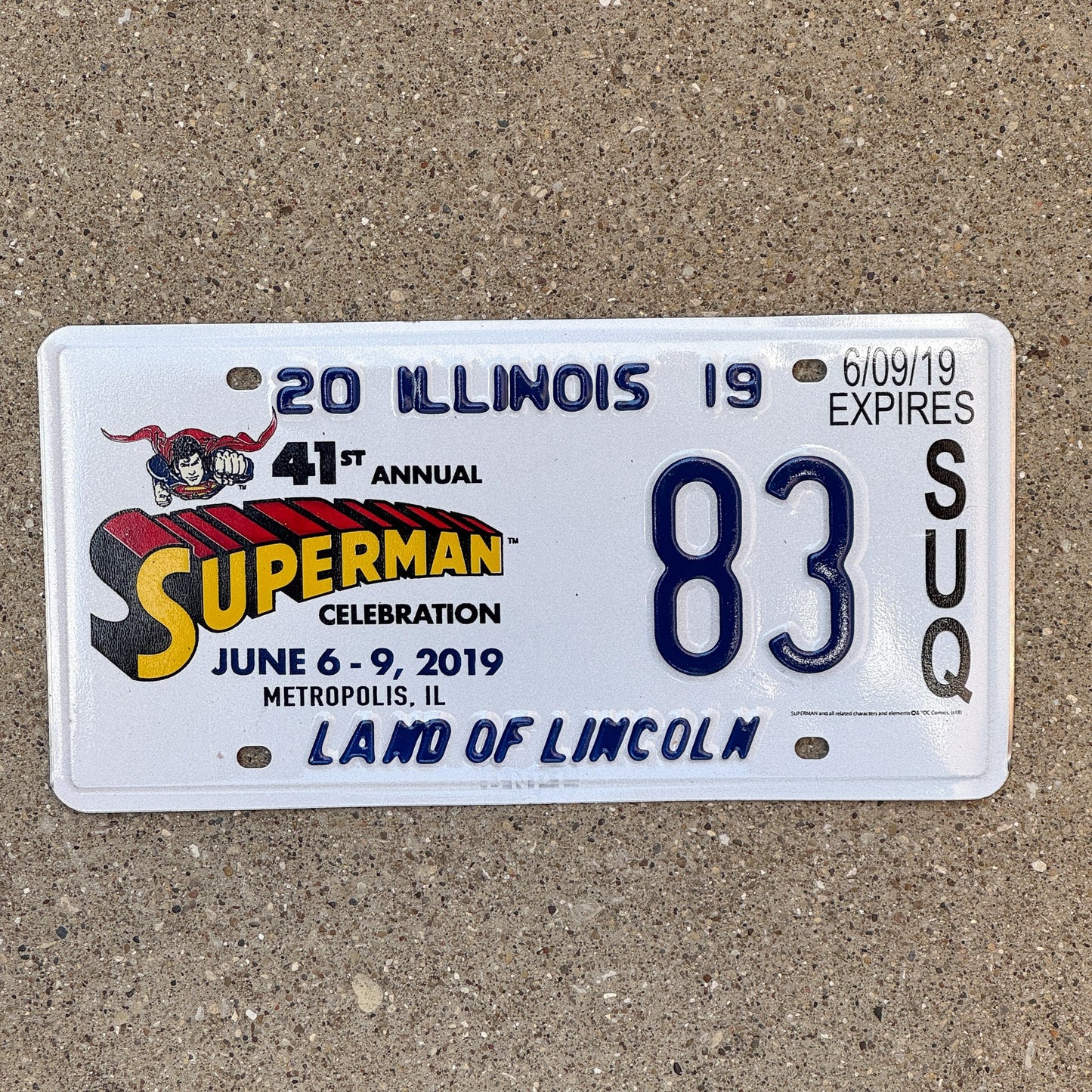 Photo of a 2019 Illinois Event License Plate Auto Tag 1 Garage Decor Metropolis Illinois Superman Comics 83 with original patina