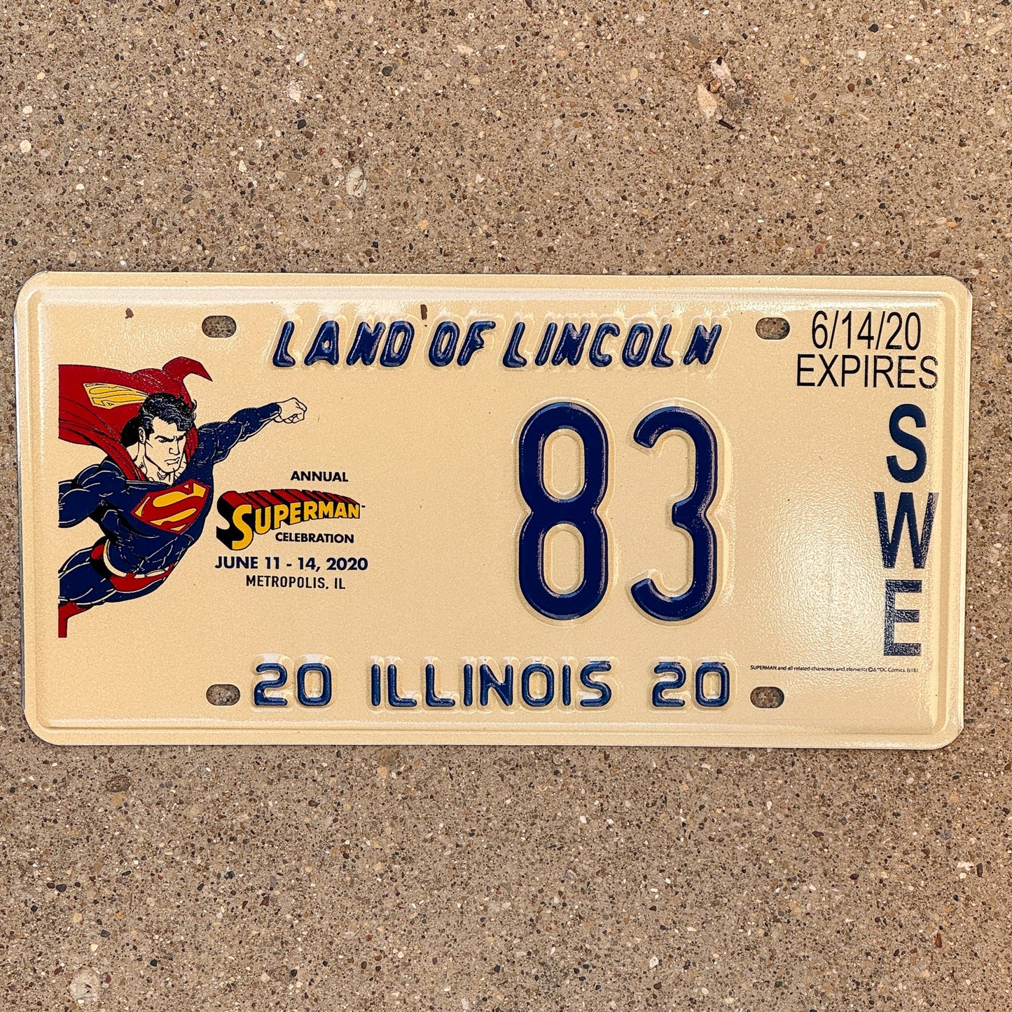 Photo of a 2020 Illinois Event License Plate Auto Tag 1 Garage Decor Metropolis Illinois Superman Comics 83 with original patina