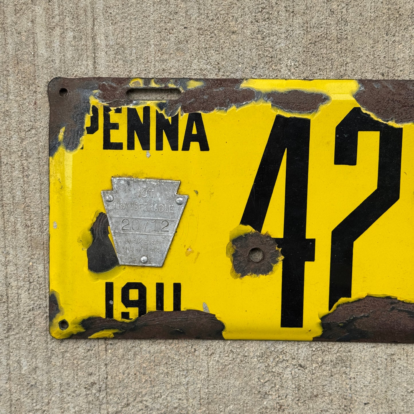 Photo of the side of a 1911 Pennsylvania Porcelain License Plate Auto Tag Garage Decor Vintage Beveled 420 Weed 42016