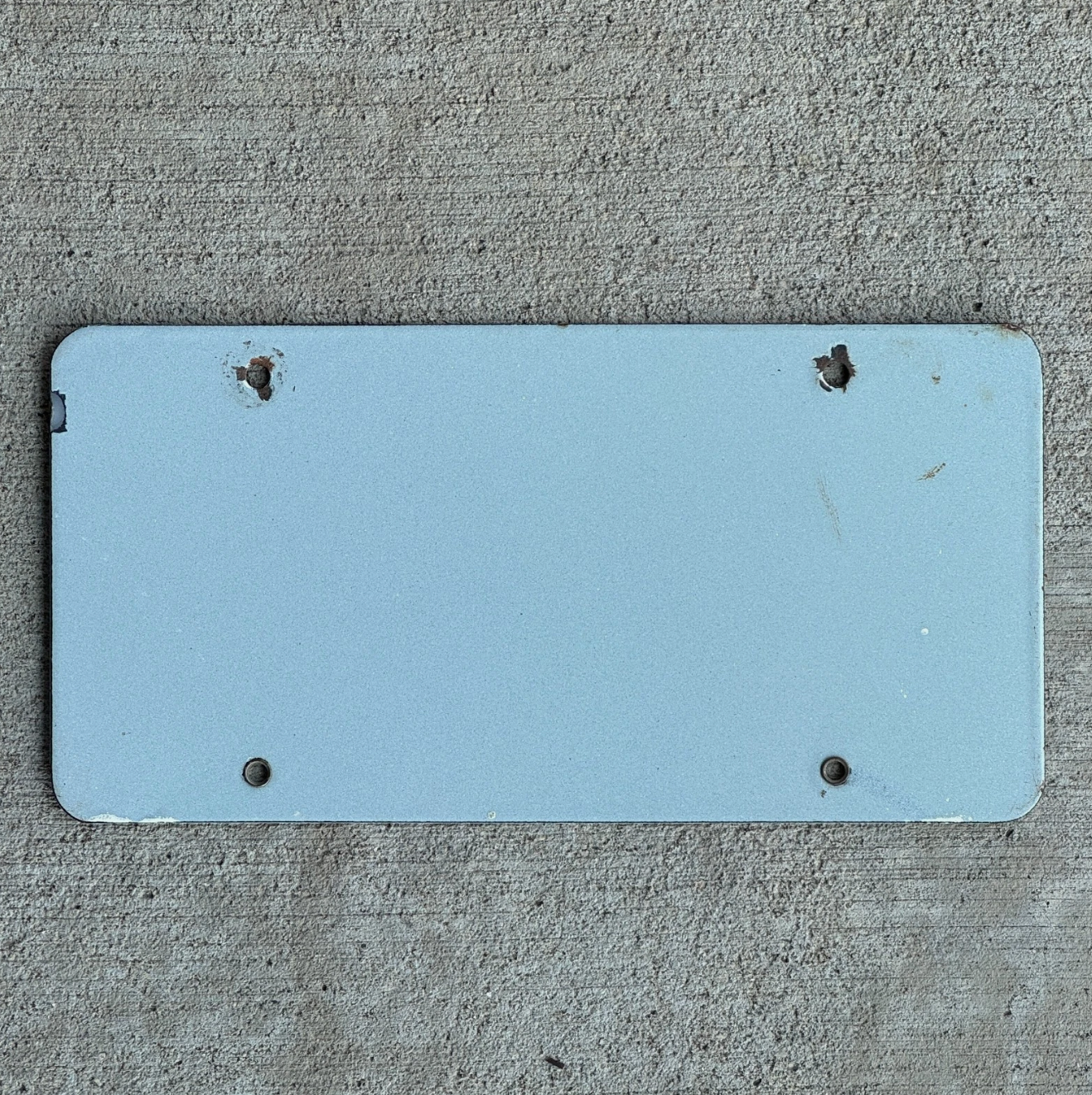 Back side of the 1960 Era Okie Tulsa Oklahoma Booster License Plate Vintage Porcelain Plate