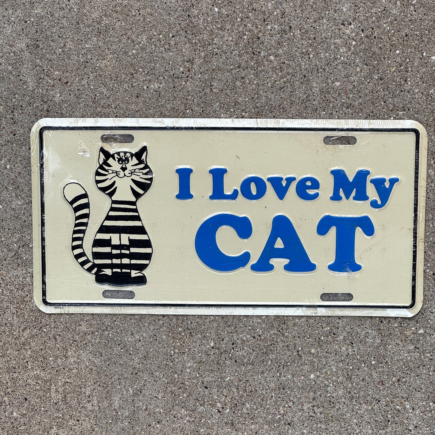 Photo of a Booster License Plate Auto Tag Garage Decor Vintage Novelty Plate I Love My Cat