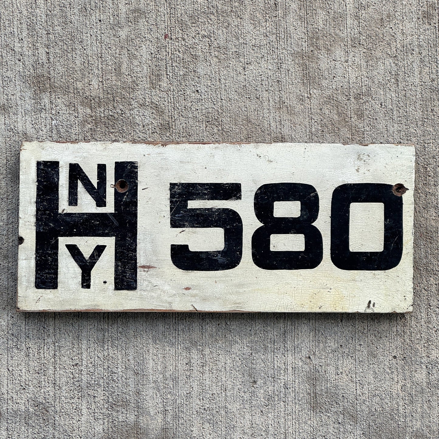 Photo of a Early Mystery Prestate License Plate Auto Tag Garage Decor Vintage New York? Hamilton Ontario Navy Yard? HNY 580 with original patina