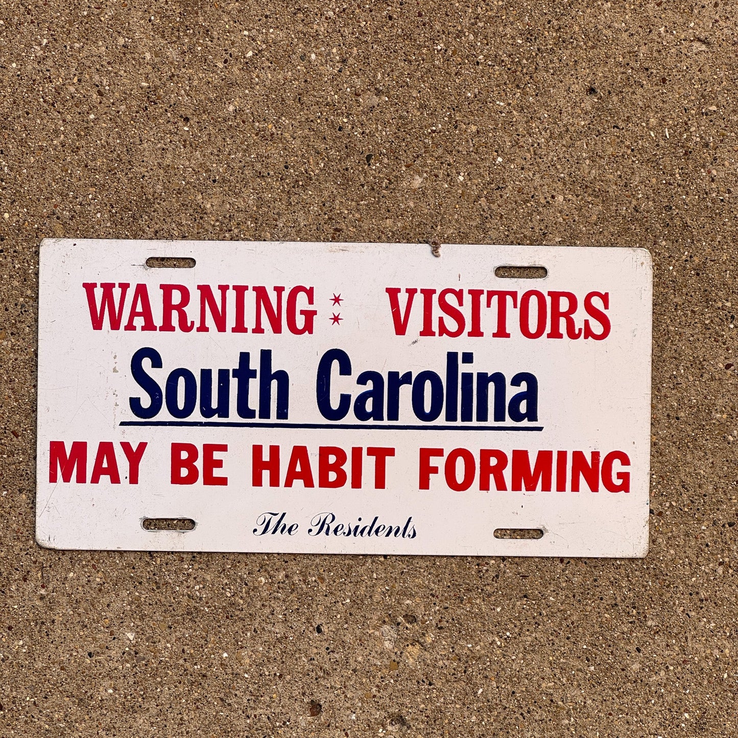 Photo of a South Carolina Booster License Plate Auto Tag Garage Decor Vintage Metal May Be Habit Forming