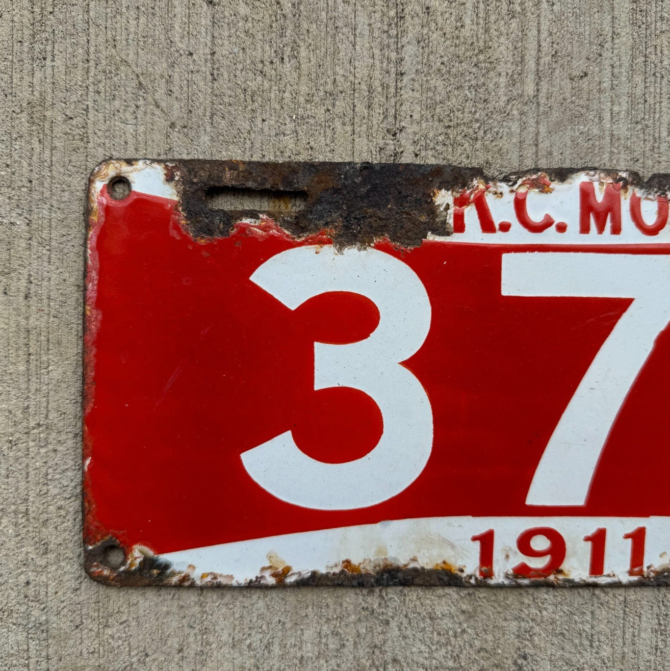 1911 Kansas City Missouri Porcelain License Plate Auto Tag 371