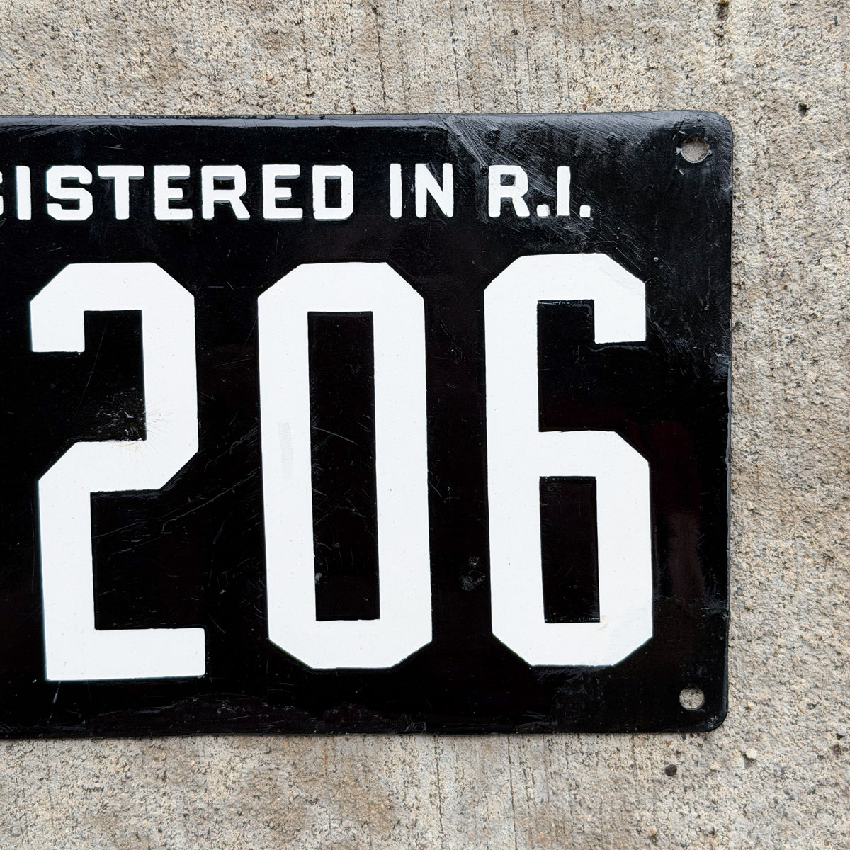 Photo of a 1904 1908 Rhode Island Porcelain License Plate Auto Tag Garage Decor Vintage 3206 with original patina