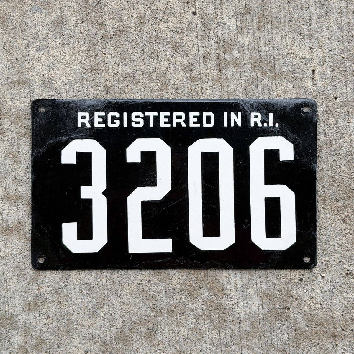 Photo of a 1904 1908 Rhode Island Porcelain License Plate Auto Tag Garage Decor Vintage 3206 with original patina