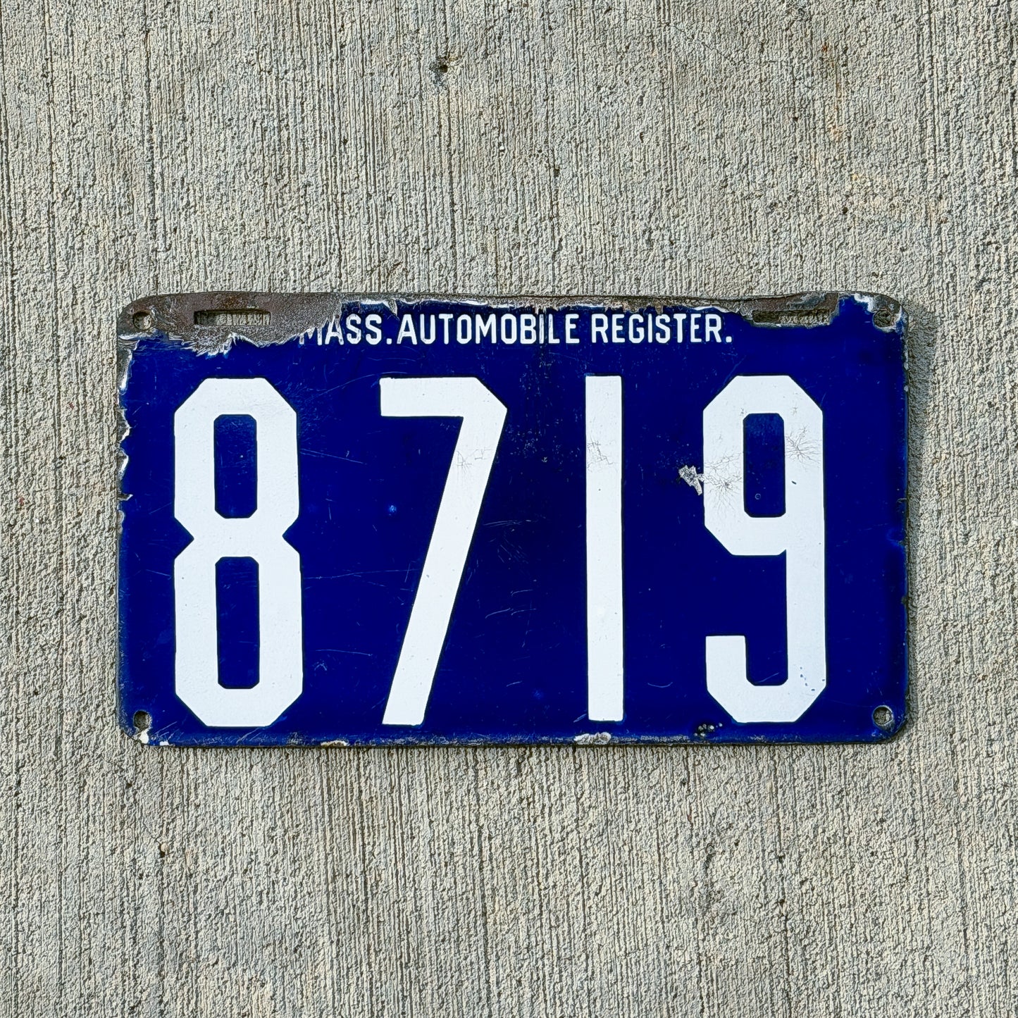 Photo of a 1904 Massachusetts Porcelain License Plate Auto Tag Garage Decor Vintage Nice Quality Four Digit Small Font 8719 with original patina