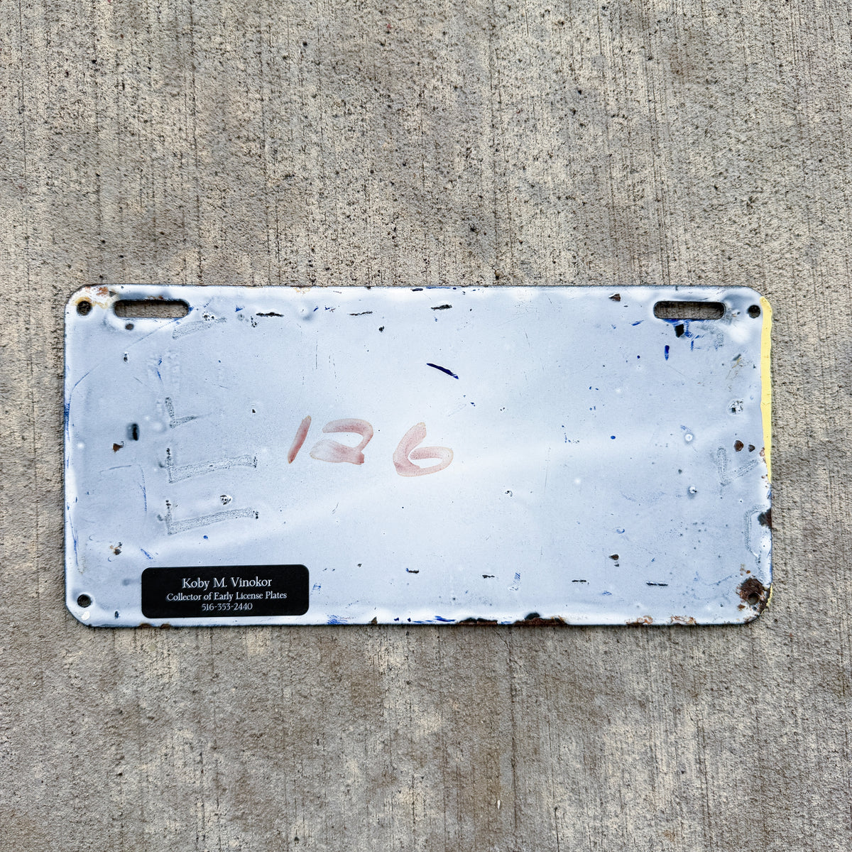 Photo of a 1905 1906 Massachusetts Porcelain License Plate Auto Tag 1 Vintage Garage MAR Mass Auto Register 18078 with original patina